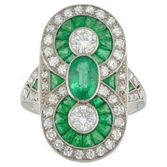 An Art Deco style diamond and emerald plaque ring