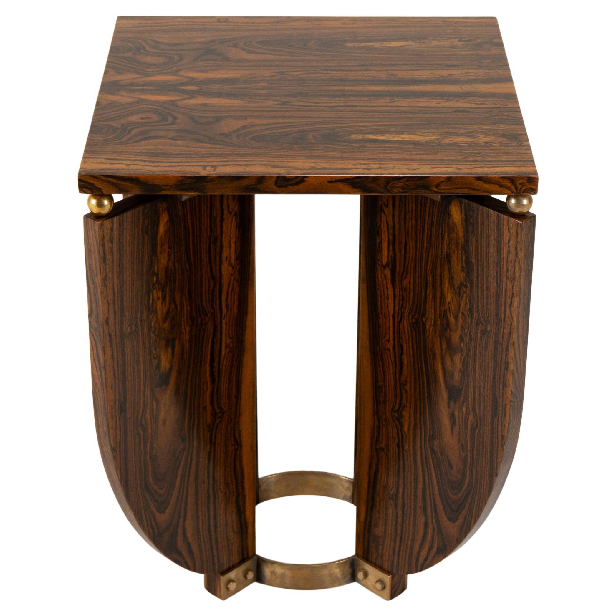 An Art Deco Style End Table With a Brass Base