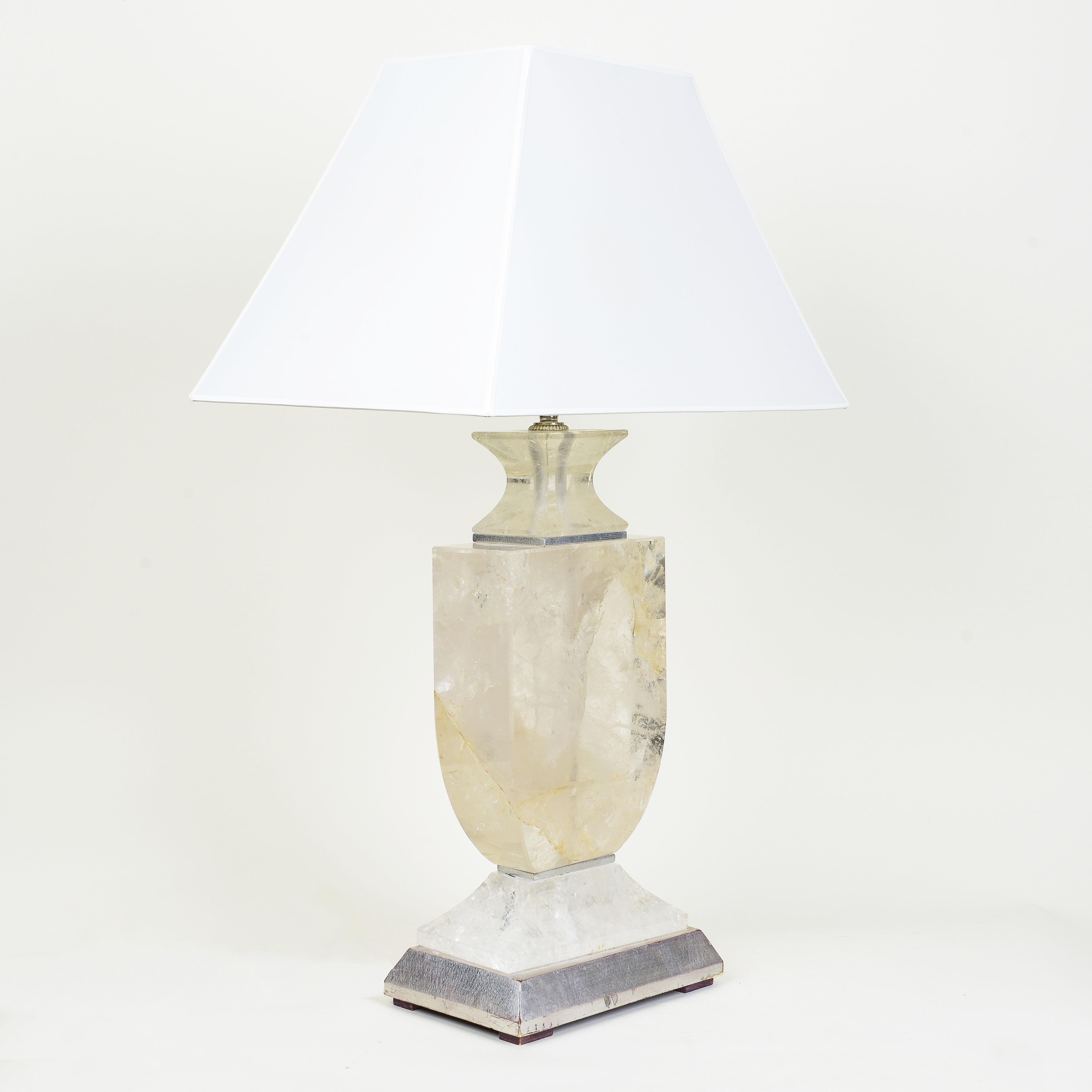 A quartz table lamp with an elegant inward tapering design, resting on a rectangular base. Acquired from the Doyle Belle Époque 19th and 20th Century Decorative Arts.