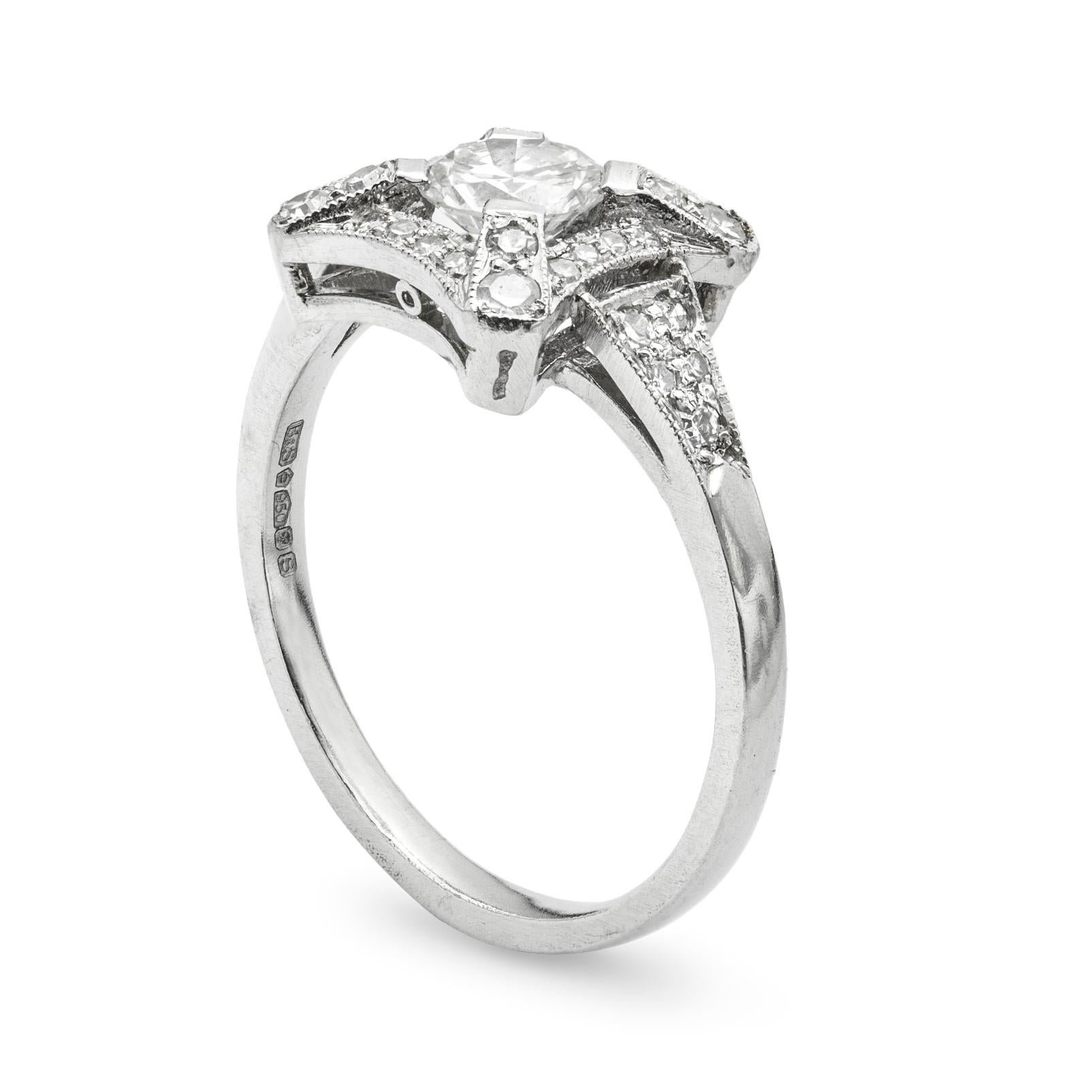 An Art Deco style diamond square cluster ring, the central old brilliant-cut diamond estimated to weigh 0.50 carats, claw-set to the centre of an openwork diamond-set square frame, with diamond-set shoulders, all millegrain-set to a platinum mount,