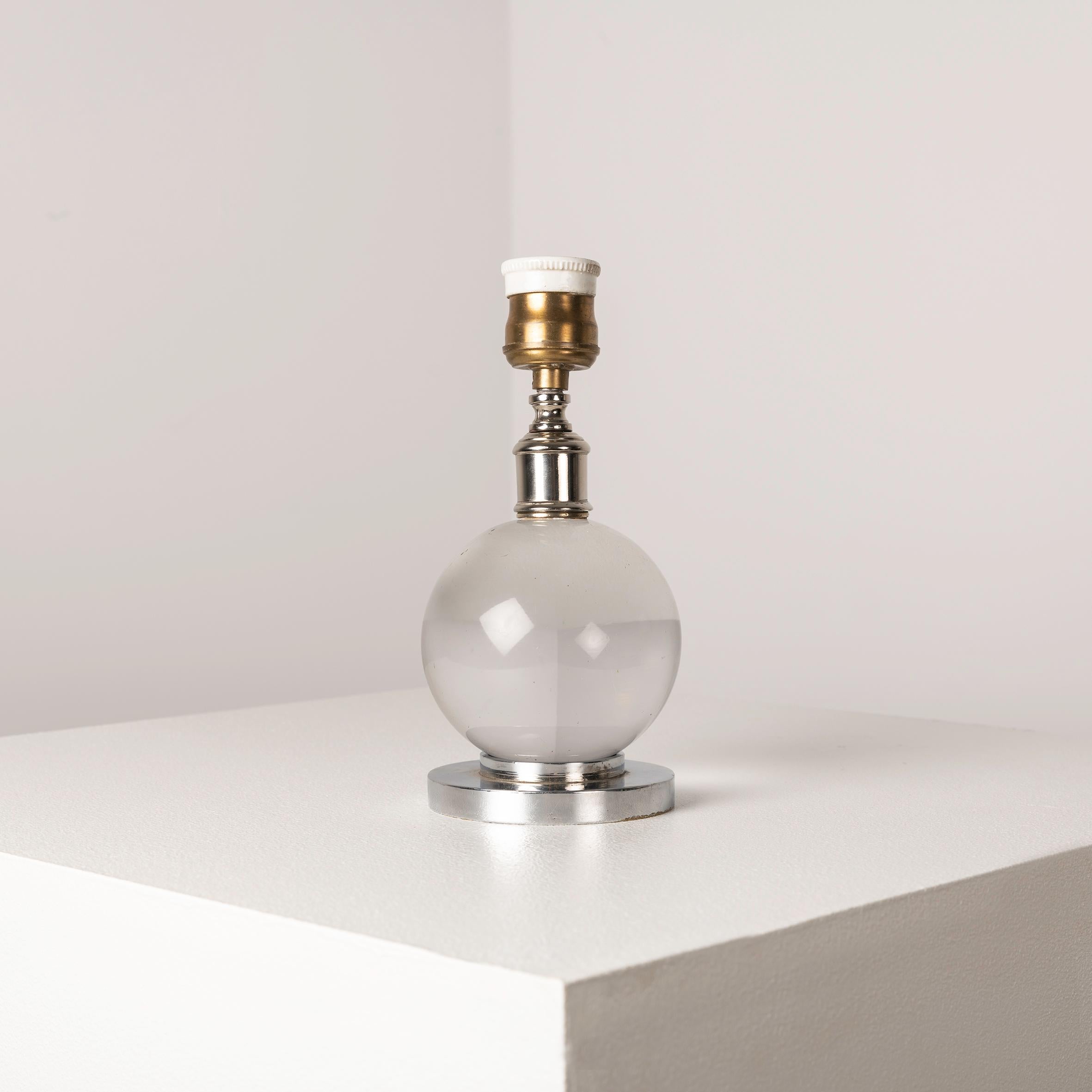 
ChatGPT
Behold the enchanting allure of Jacques Adnet's Art Deco crystal ball lamp for Baccarat, a sublime symphony of design and luxury. Adnet's ingenuity is evident in the lamp's ethereal sphere, crafted with precision and adorned with Baccarat's