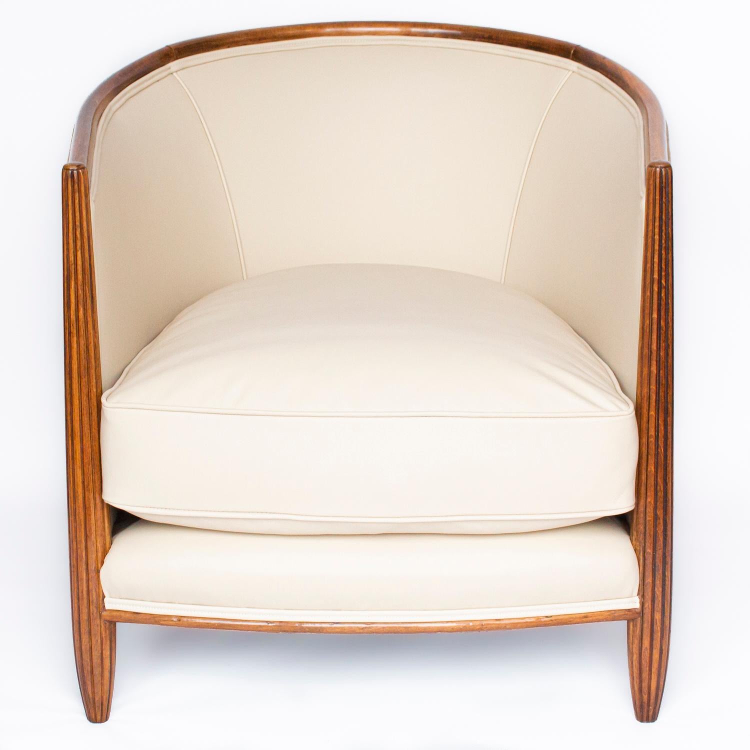 An Art Deco tub chair in beechwood. Reupholstered in cream suede and leather.

Dimensions: H 68cm, W 62cm, D 54cm, Seat H 34cm, Seat D 54cm

Origin: French

Date: circa 1930

Item No: 1103201

All of our furniture is extensively polished