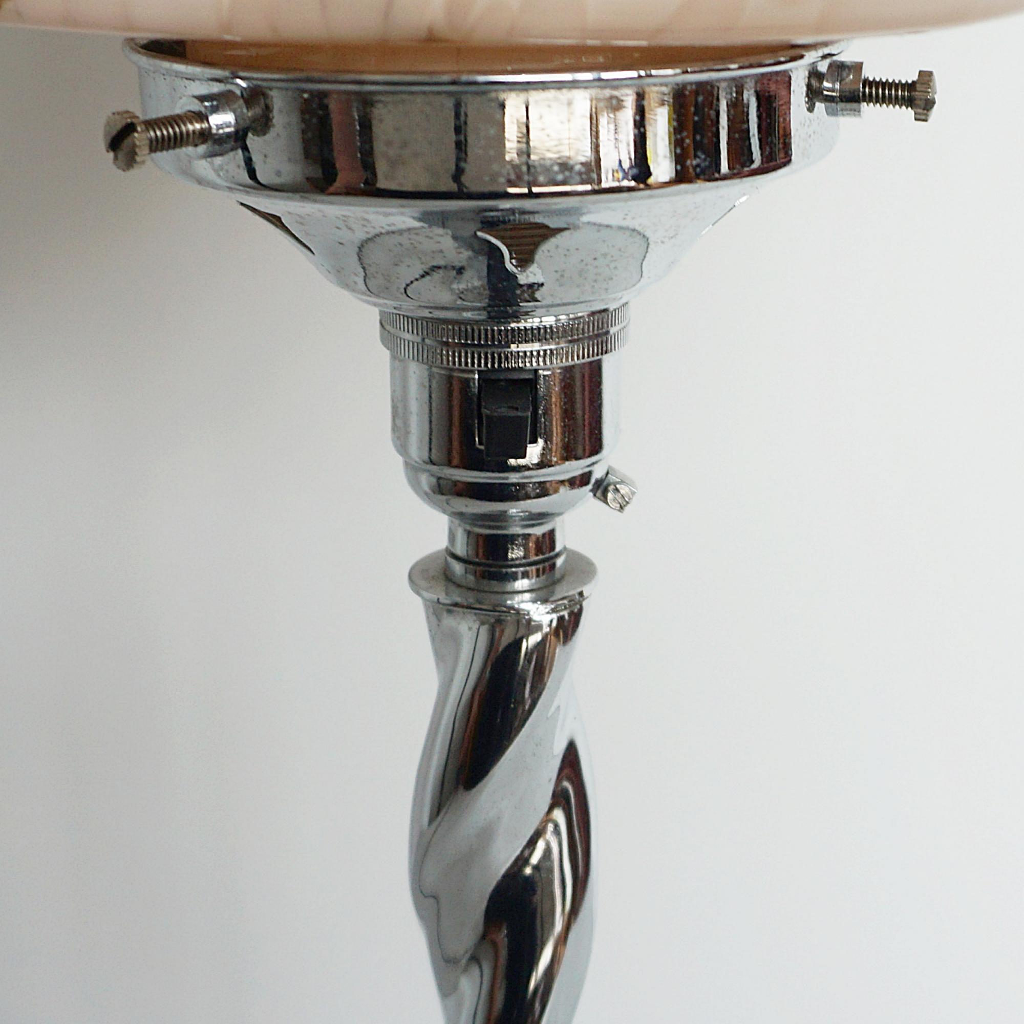 20th Century An Art Deco Twisted Chromed Metal and Marbled Glass Table Lamp For Sale