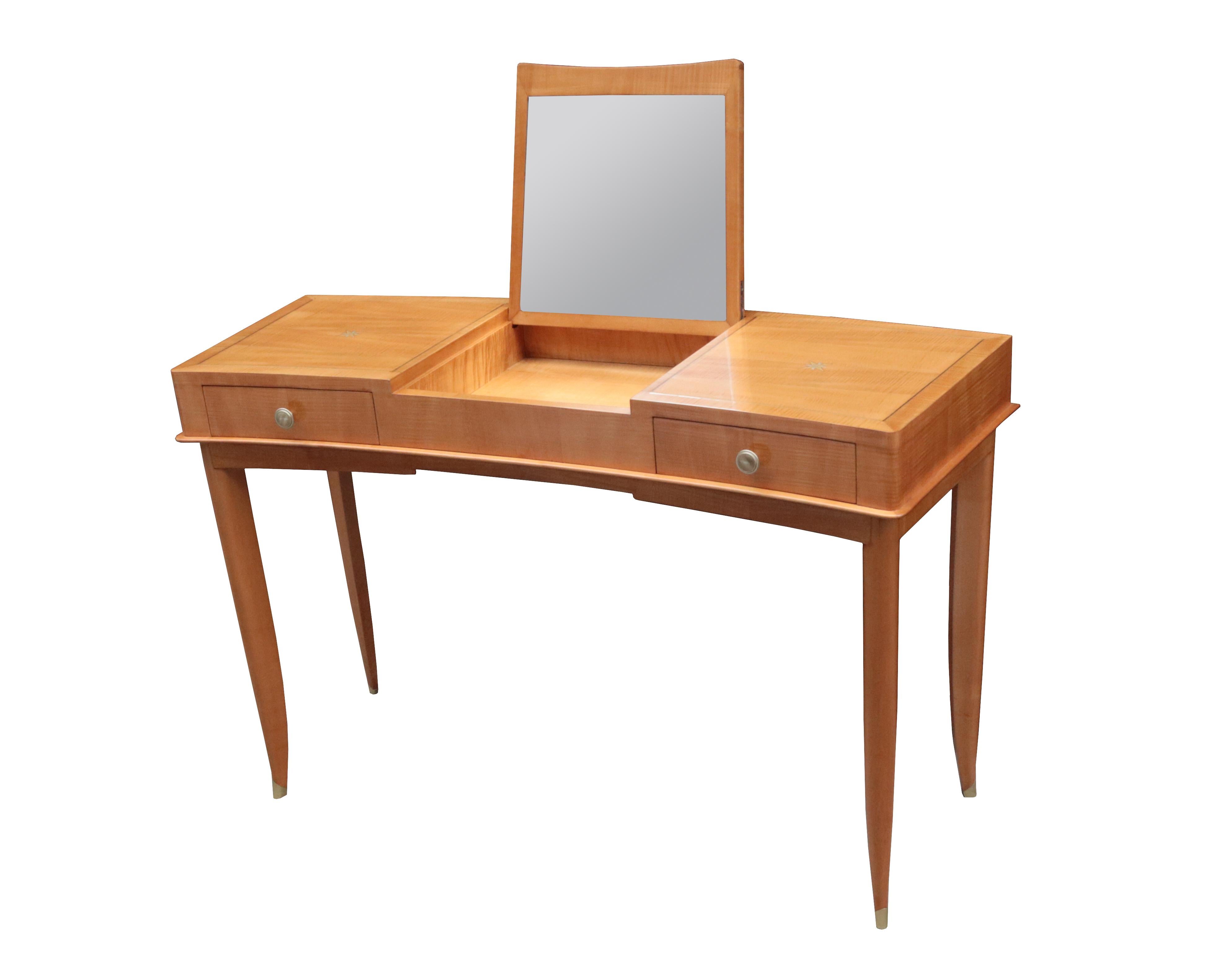 An Art Deco vanity table with pull up mirror.
Sycamore with patinated brass details and inlay.
 