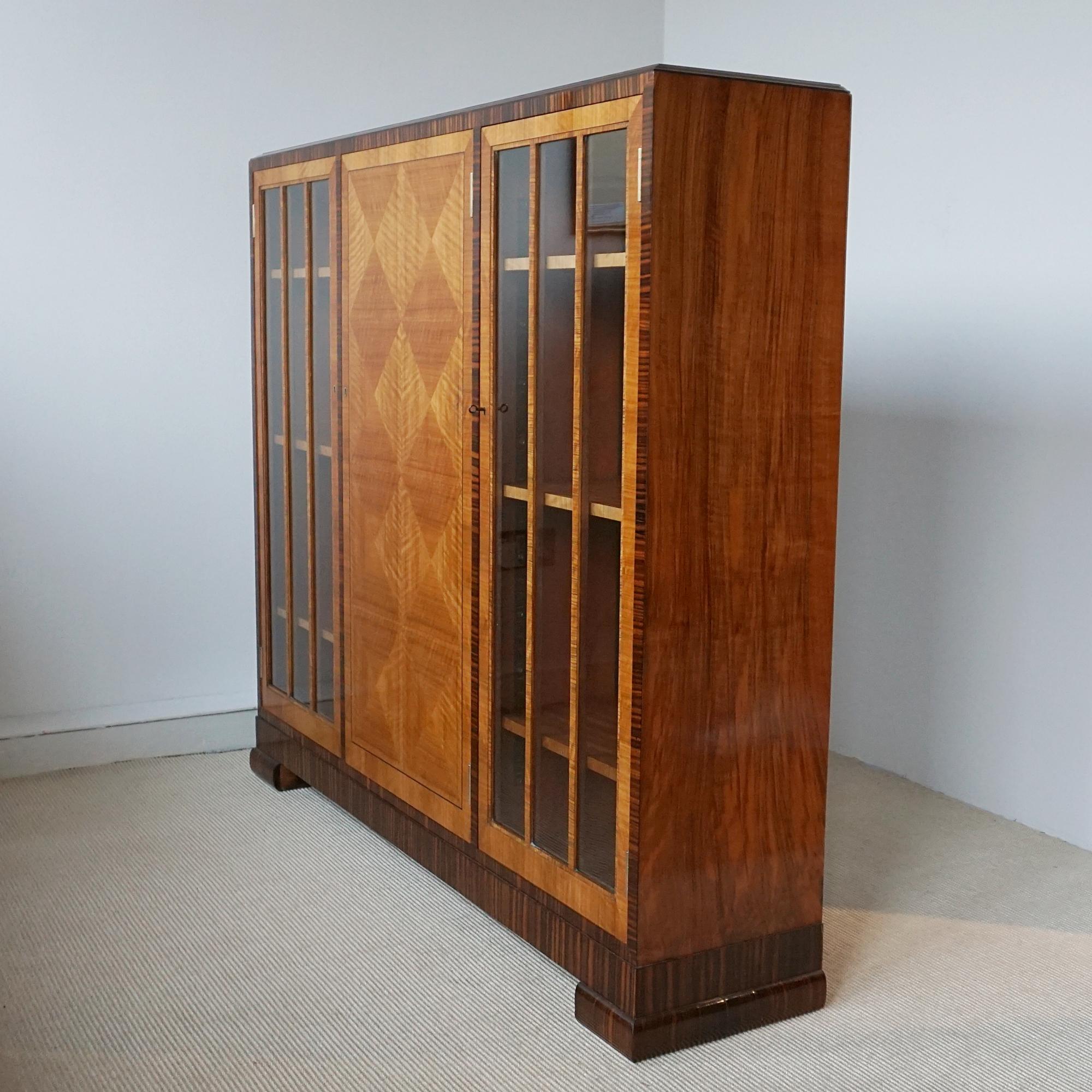 An Art Deco Walnut and Macassar Ebony Cabinet by Heal's of London 5