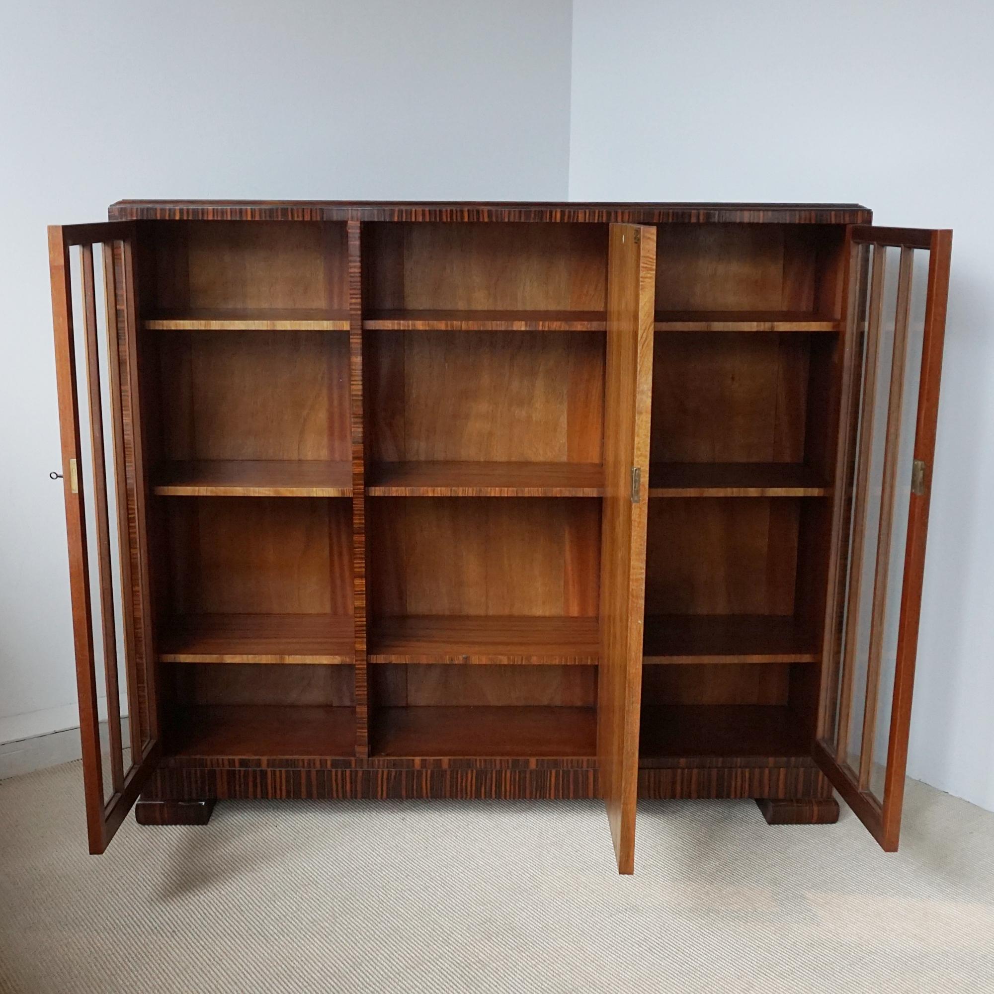 An Art Deco Walnut and Macassar Ebony Cabinet by Heal's of London In Good Condition In Forest Row, East Sussex