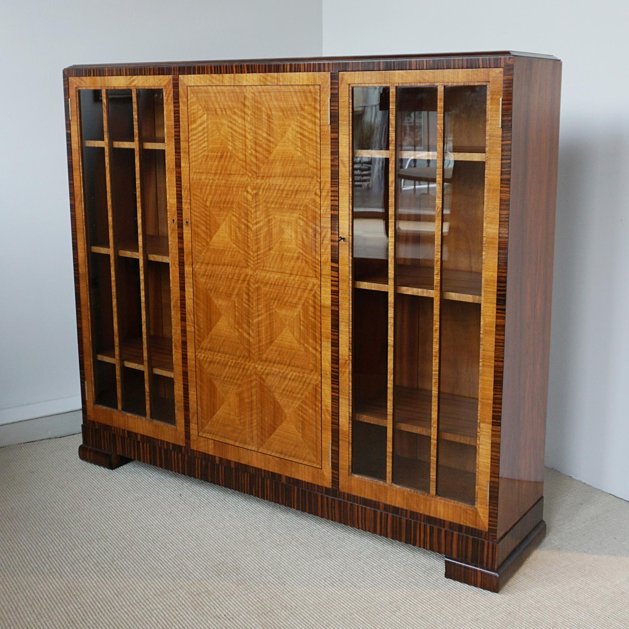 An Art Deco Walnut and Macassar Ebony Cabinet by Heal's of London 4