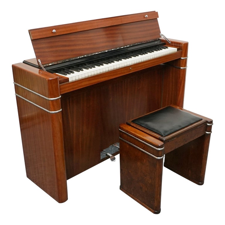 An Art Deco Walnut Mini 