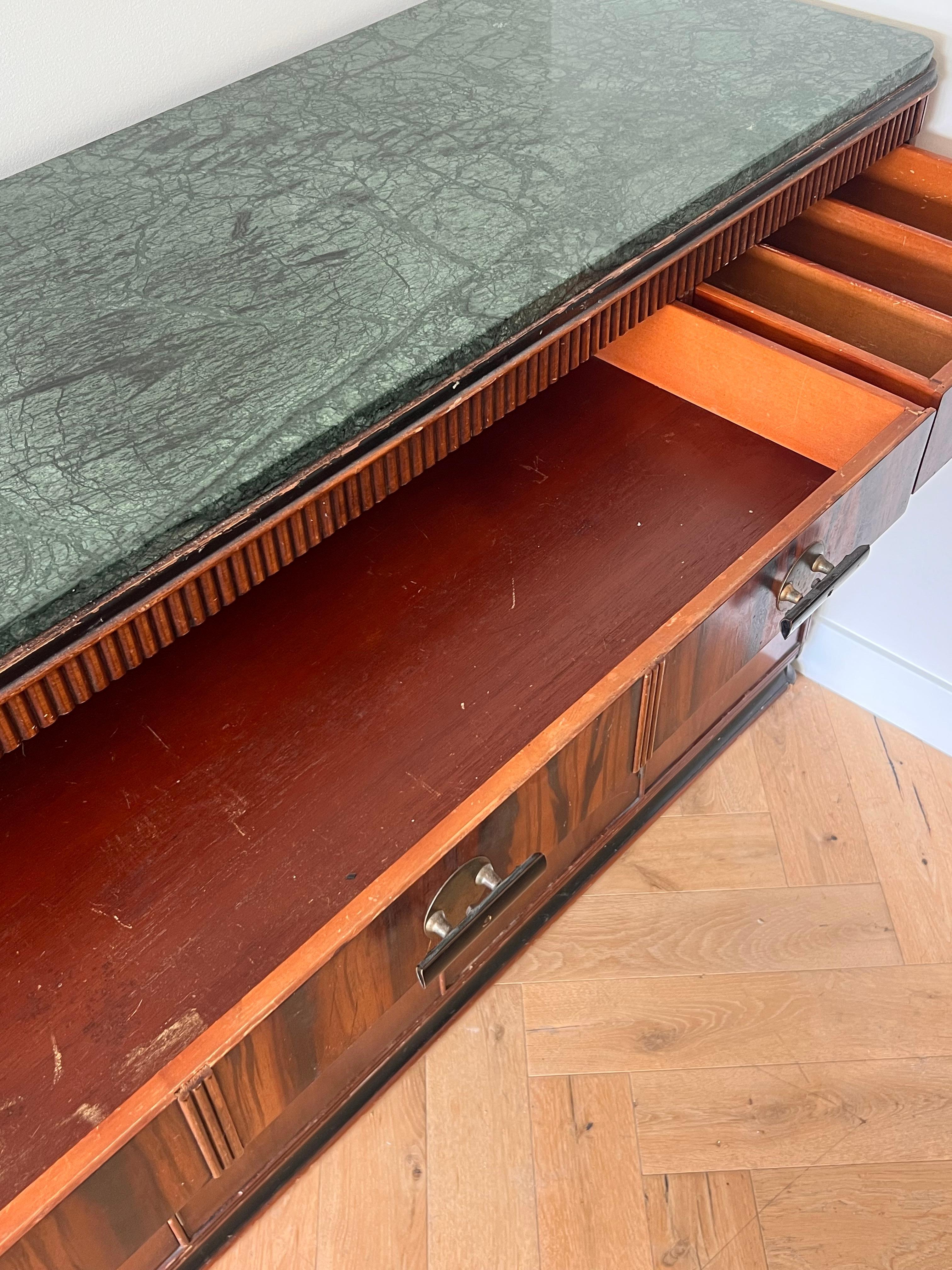 An art deco wood and marble buffet by Built by John, late 19th century 1