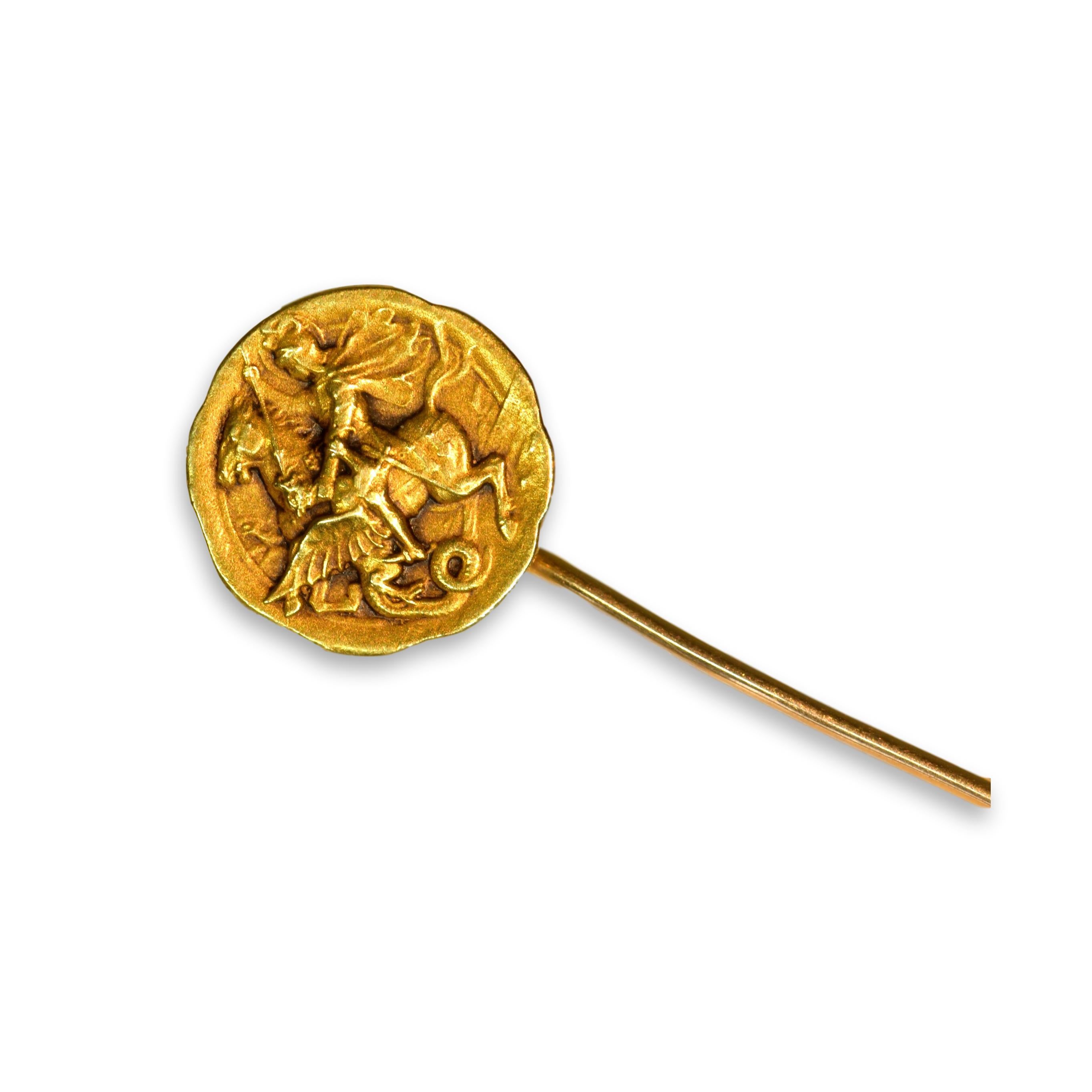 An unusual solid 18ct gold carved tie pin of a goddess riding war horse that was made circa 1890-1910. The detail of the gold work is brilliant.  Typical very fine gold work of Art Nouveau. Perfect condition. 

Weight: 3g
Length: 6cm
Width: 13mm

We