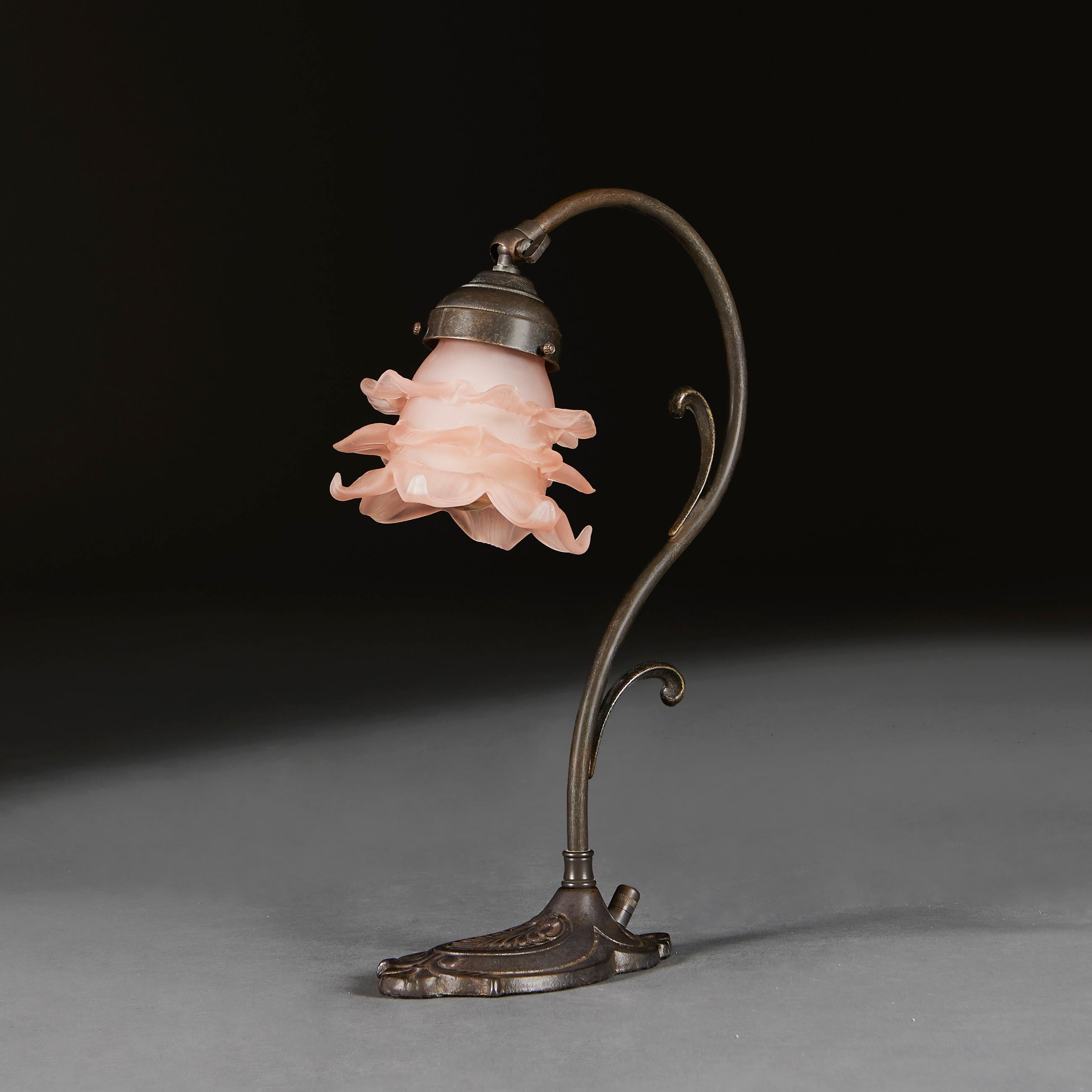 France, circa 1910

An unusual Art Nouveau bronzed desk lamp, with artichoke shade, all supported on an oval base with foliate designs.

Measures: Height 36.00cm
Depth of base 17.00cm.

Please note: This is currently wire for the UK with BC bulb