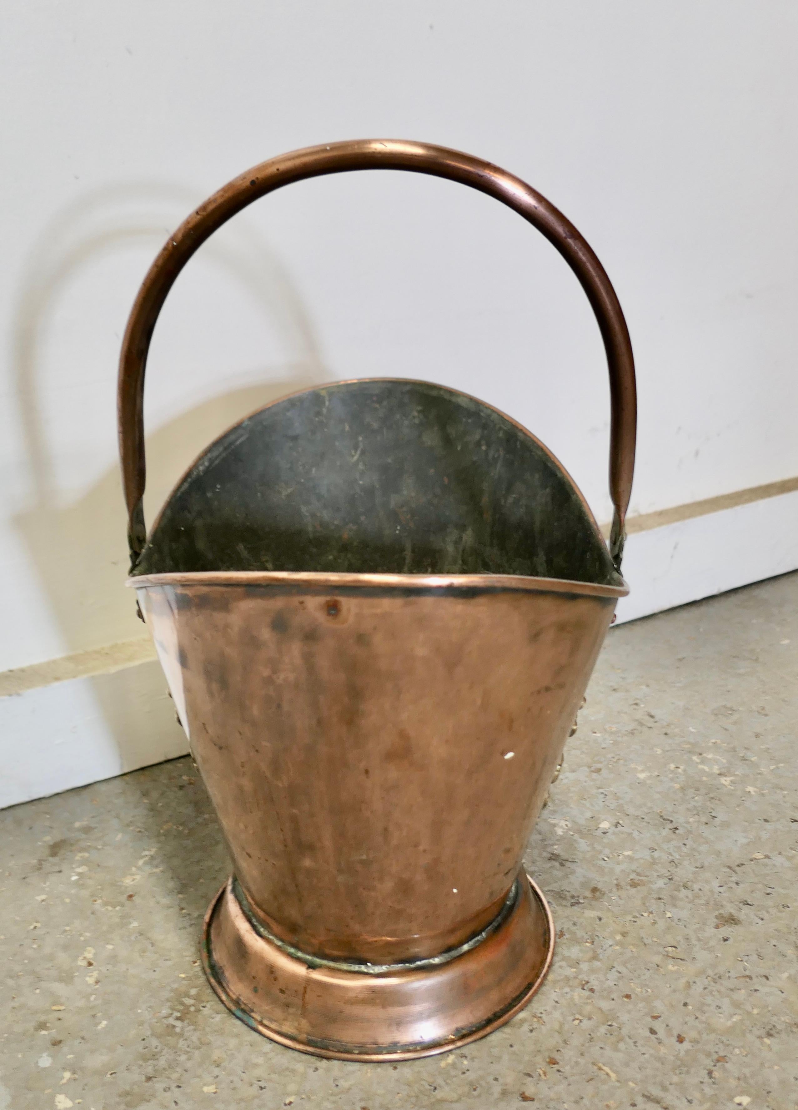 An Art Nouveau Embossed Copper Helmet Coal Scuttle For Sale 2