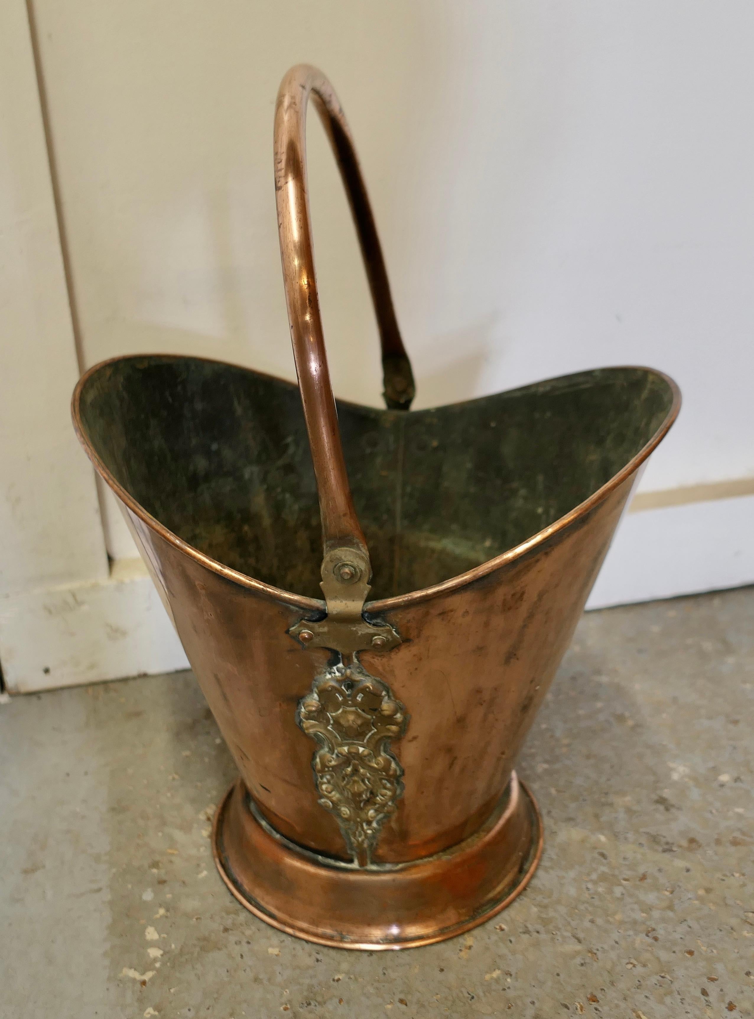 An Art Nouveau Embossed Copper Helmet Coal Scuttle For Sale 3