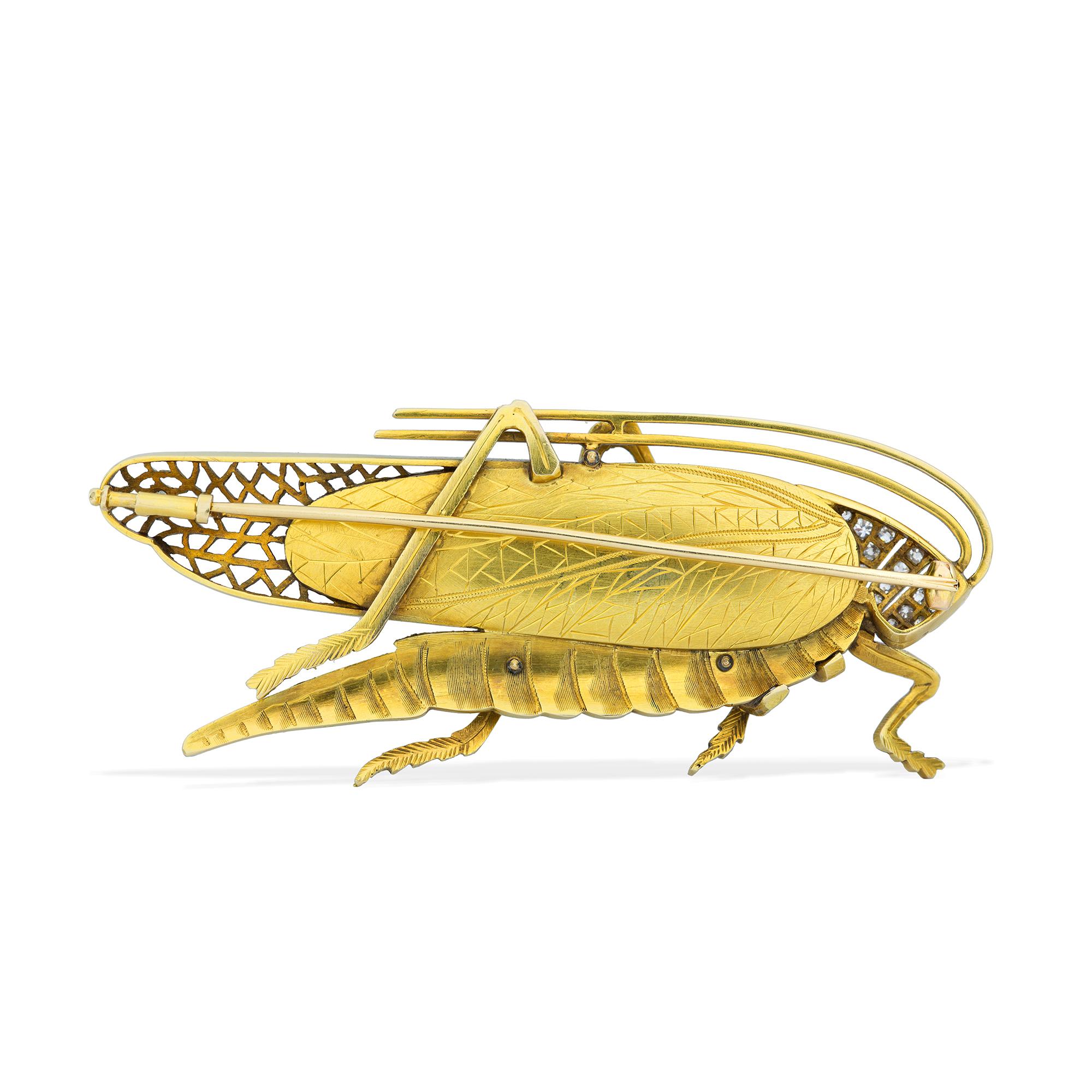 A vintage gold mounted grasshopper brooch, the body set with a mabe pearl and the head set with diamonds with ruby eye, all to a realistically carved gold body, circa 1930, measuring approximately 3.1x7.4cm, gross weight 23.8 grams.

An exquisitely