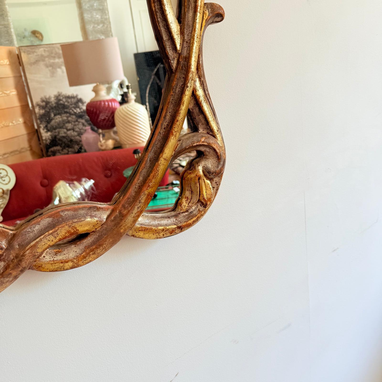 20ième siècle Miroir Art Nouveau dans un cadre en bois doré et argenté. A.I.C. C.1910 en vente