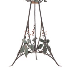 An Art Nouveau style iron plant stand, C. 1950.