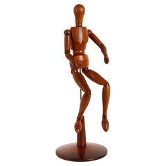 An articulated artist dummy, made out of oak wood, France 1920.