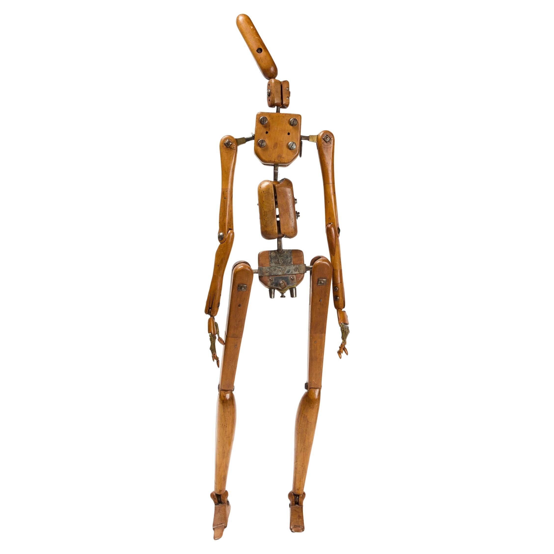 Un manichino articolato in legno di faggio colorato, noce e sughero in vendita