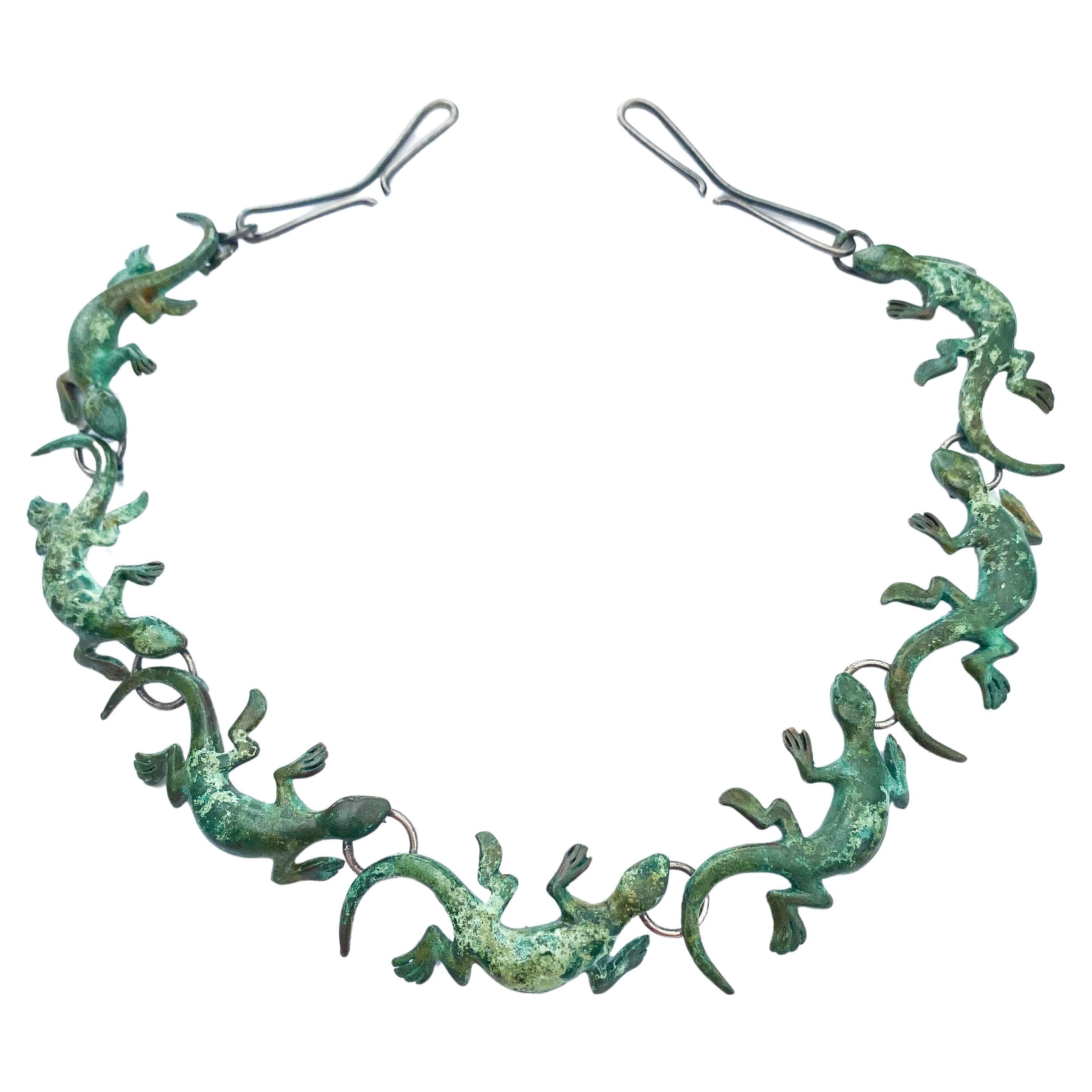 An artisan/hand made patinated bronze 'salamander' necklace, 1970s. For Sale