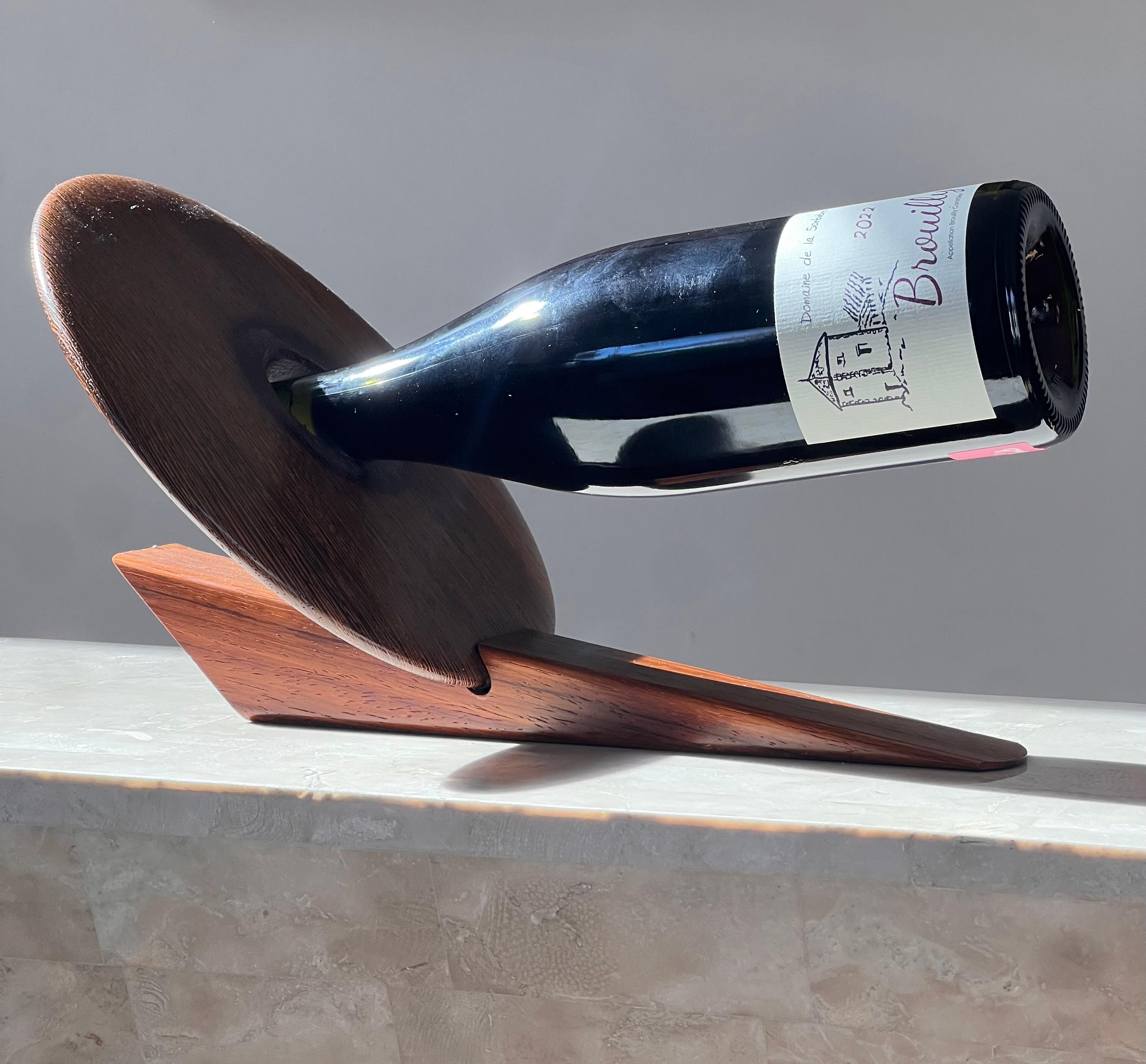 An artist-made Danish mid century teak wine holder, signed, mid 20th century 4