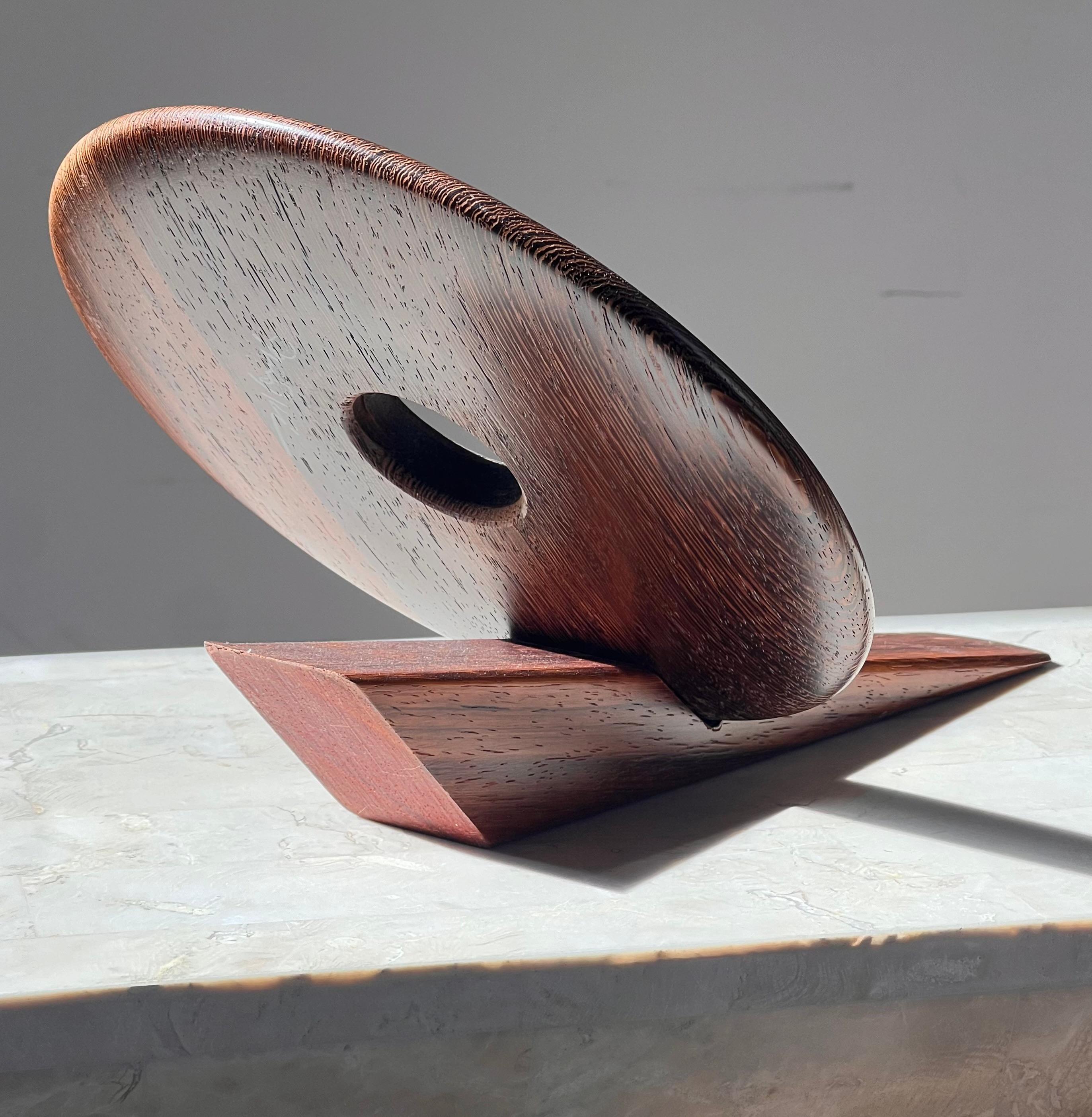 An artist-made Danish mid century teak wine holder, signed, mid 20th century 7