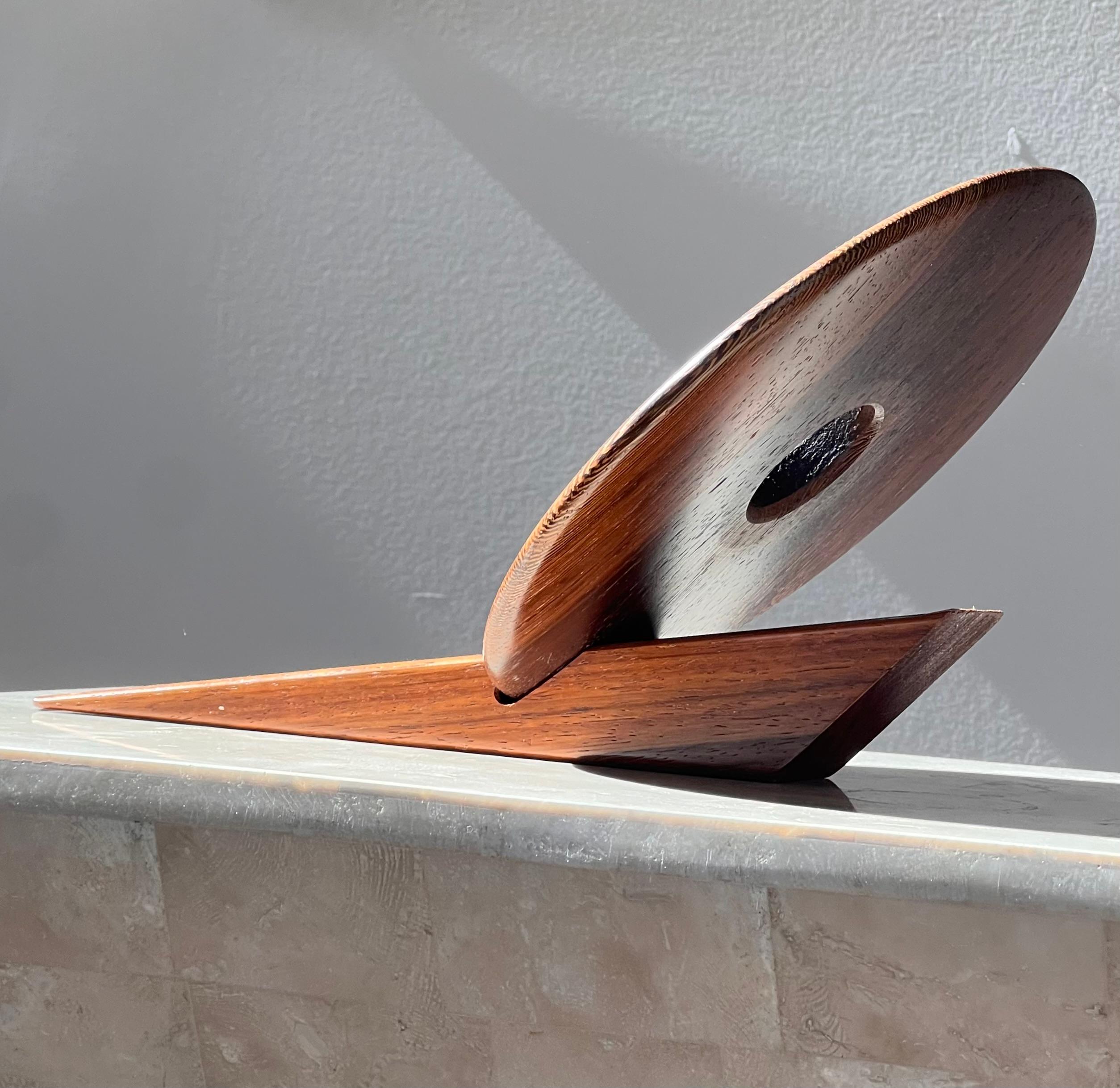 An artist-made Danish mid century teak wine holder, signed, mid 20th century 10