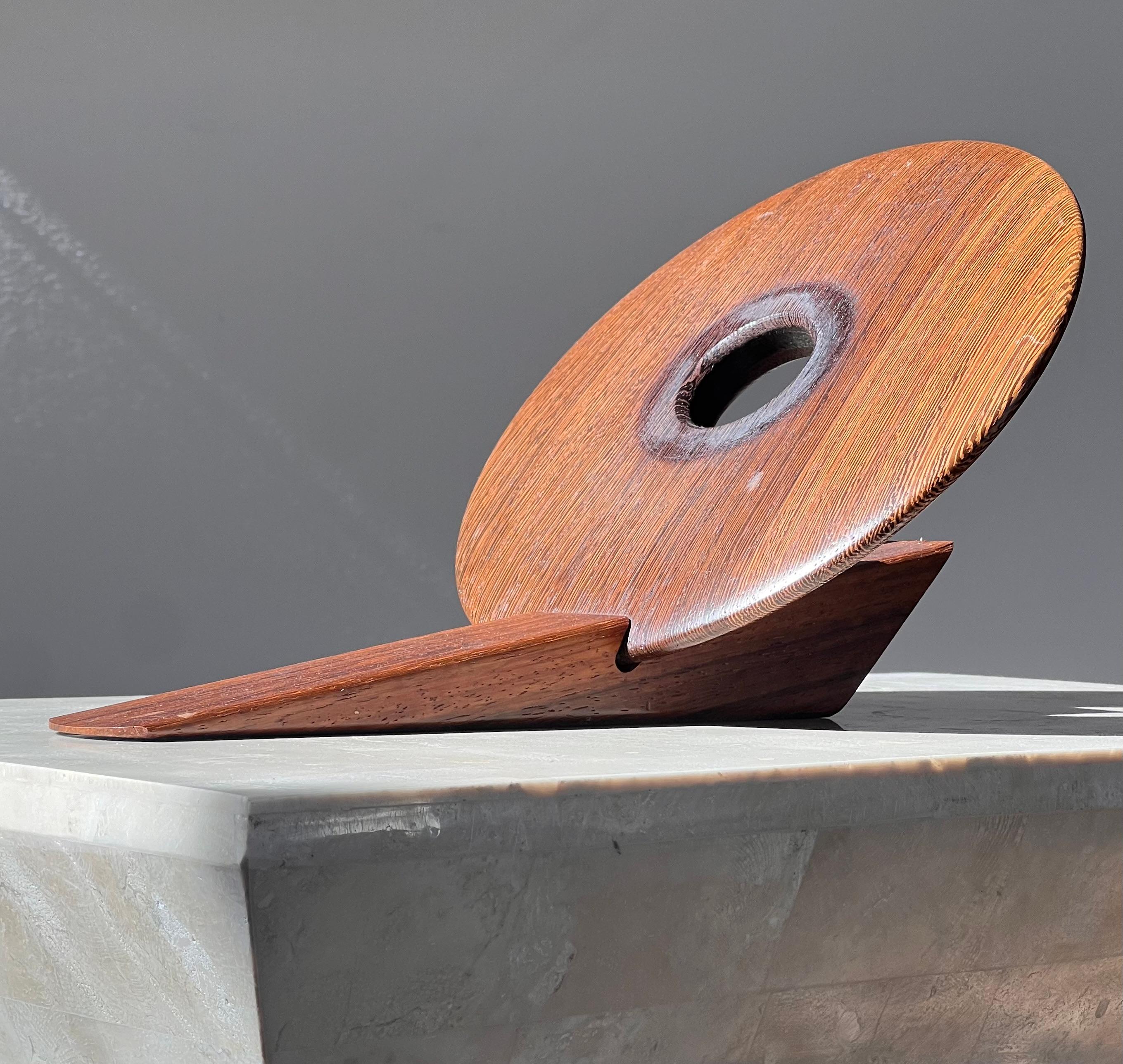 Unknown An artist-made Danish mid century teak wine holder, signed, mid 20th century