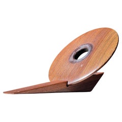 An artist-made Danish mid century teak wine holder, signed, mid 20th century
