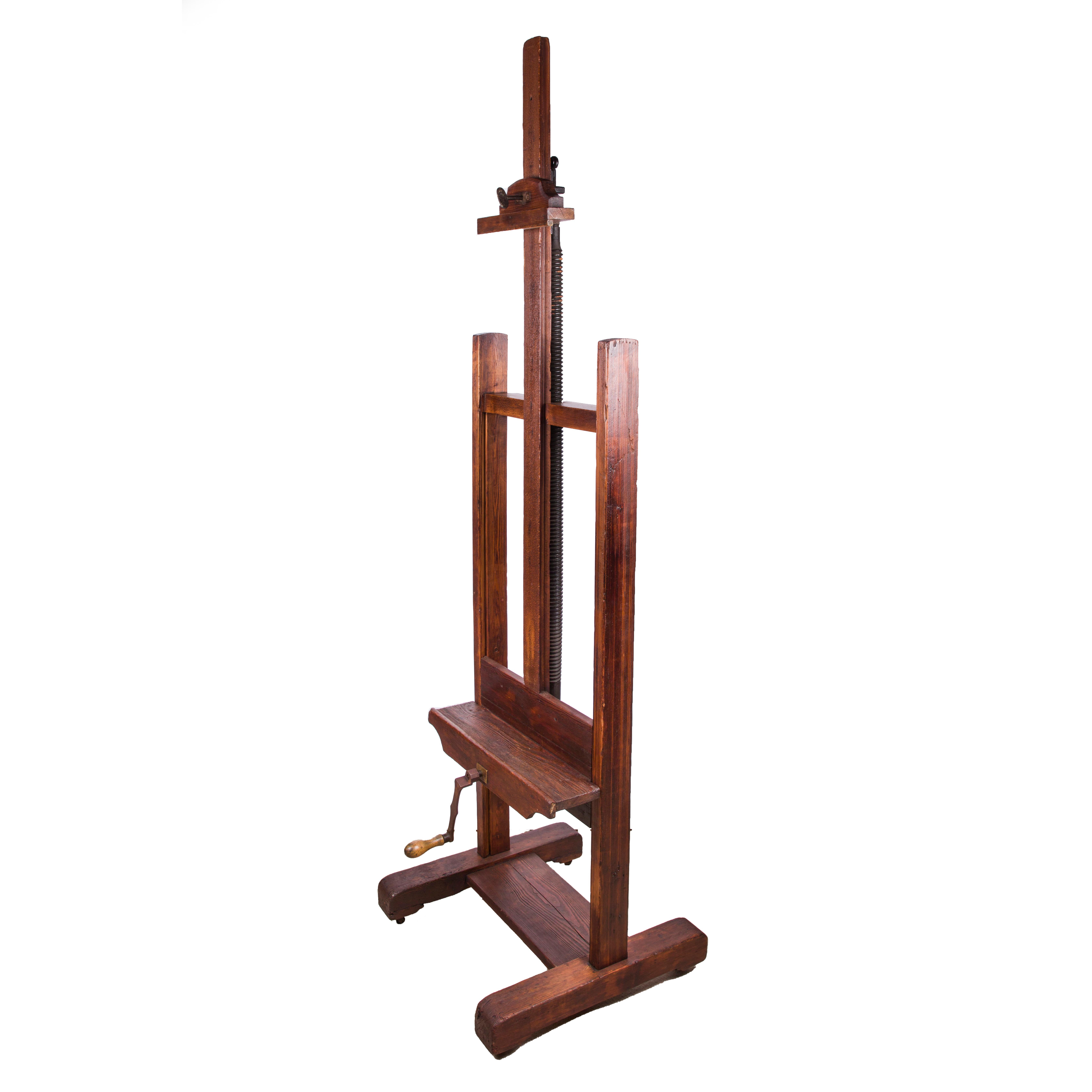 A Victorian oak H-frame artist's studio easel of adjustable height.

The height of the easel in the photographs is 80 inches - 203 cm, this height can be adjusted by using the hand cranked mechanism. Original iron and turned wood handle.

The
