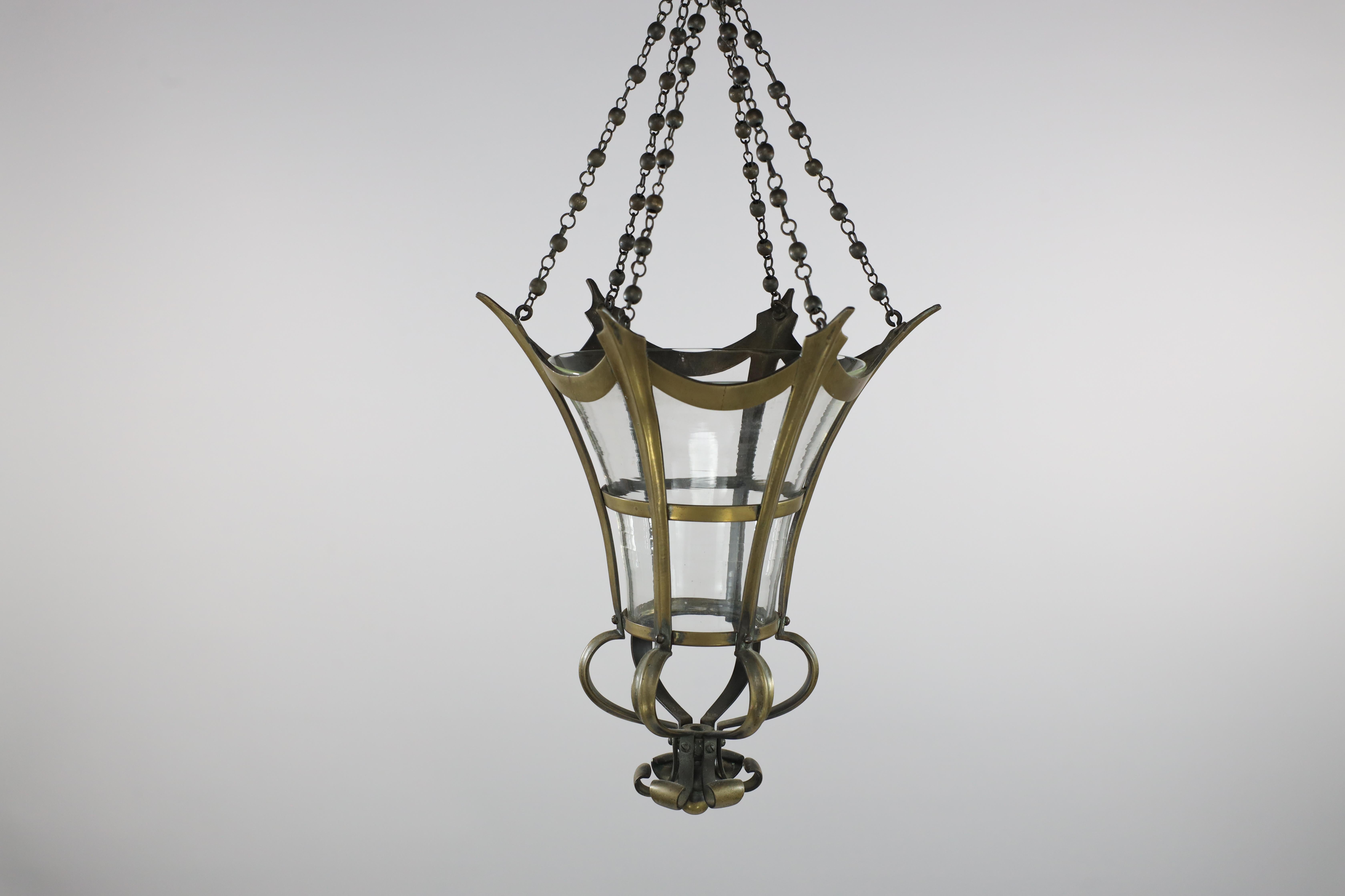 English An Arts and Crafts brass conical shaped lantern with its original conical shade For Sale
