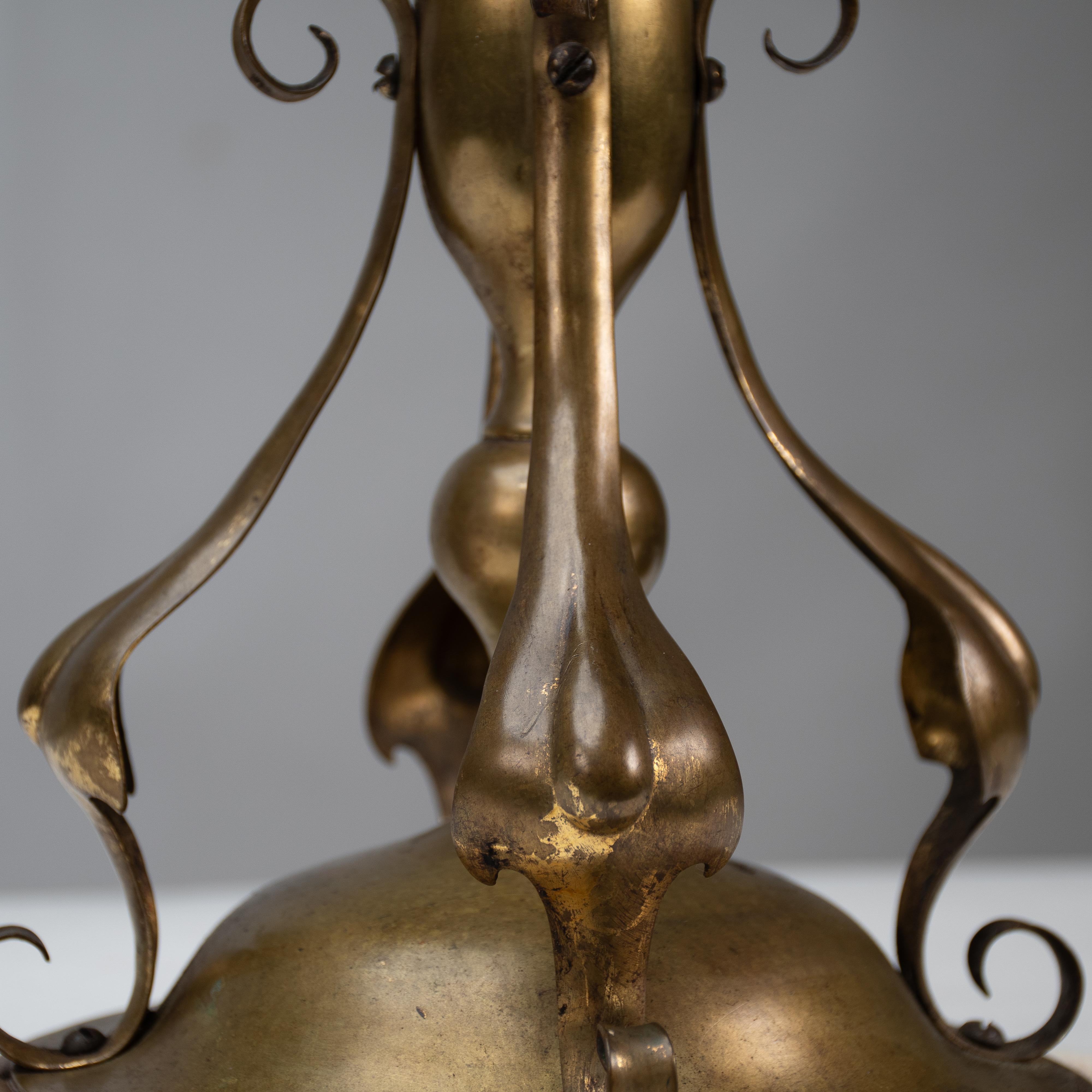 An Arts and Crafts brass table lamp in the style of C F A Voysey For Sale 9