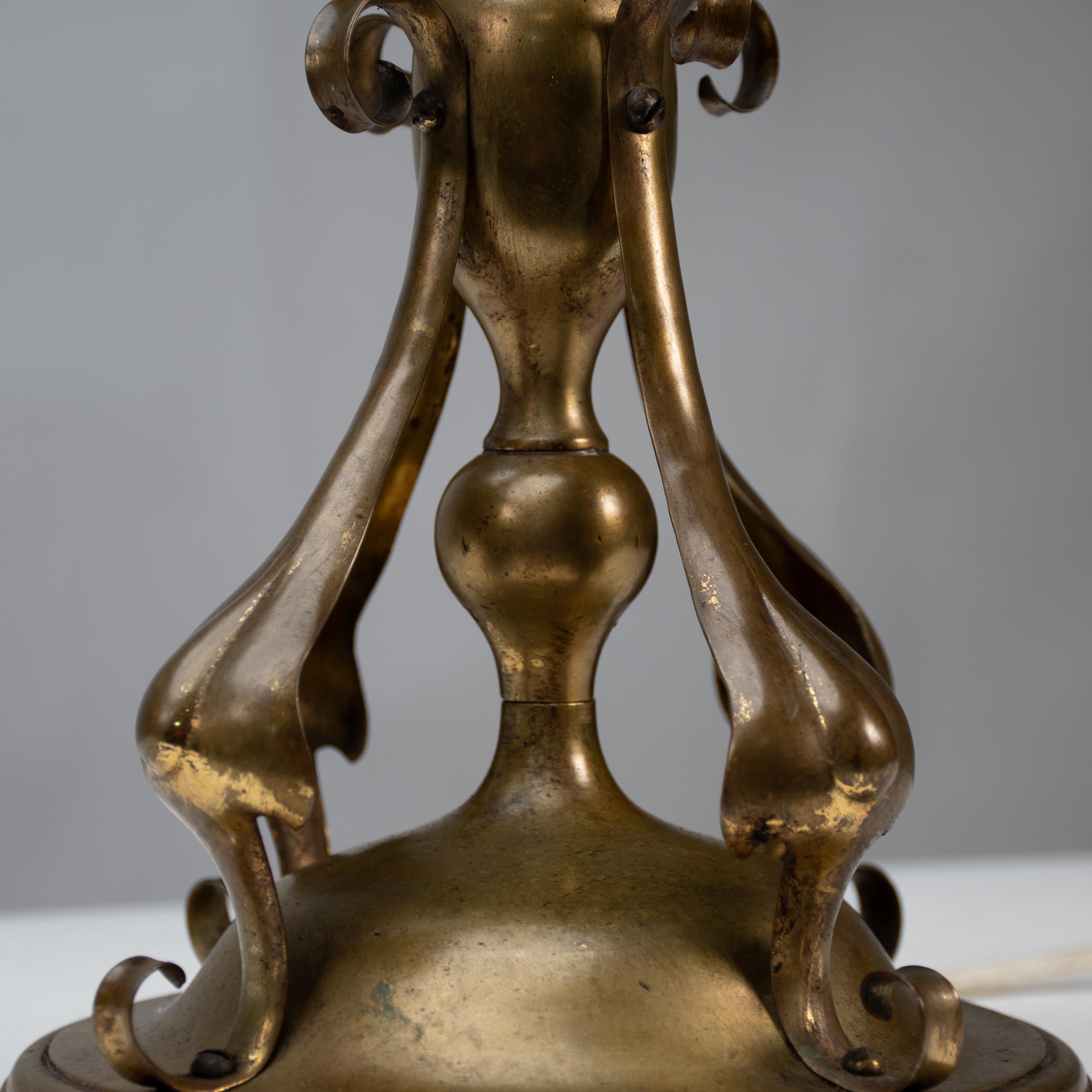 An Arts and Crafts brass table lamp in the style of C F A Voysey For Sale 10
