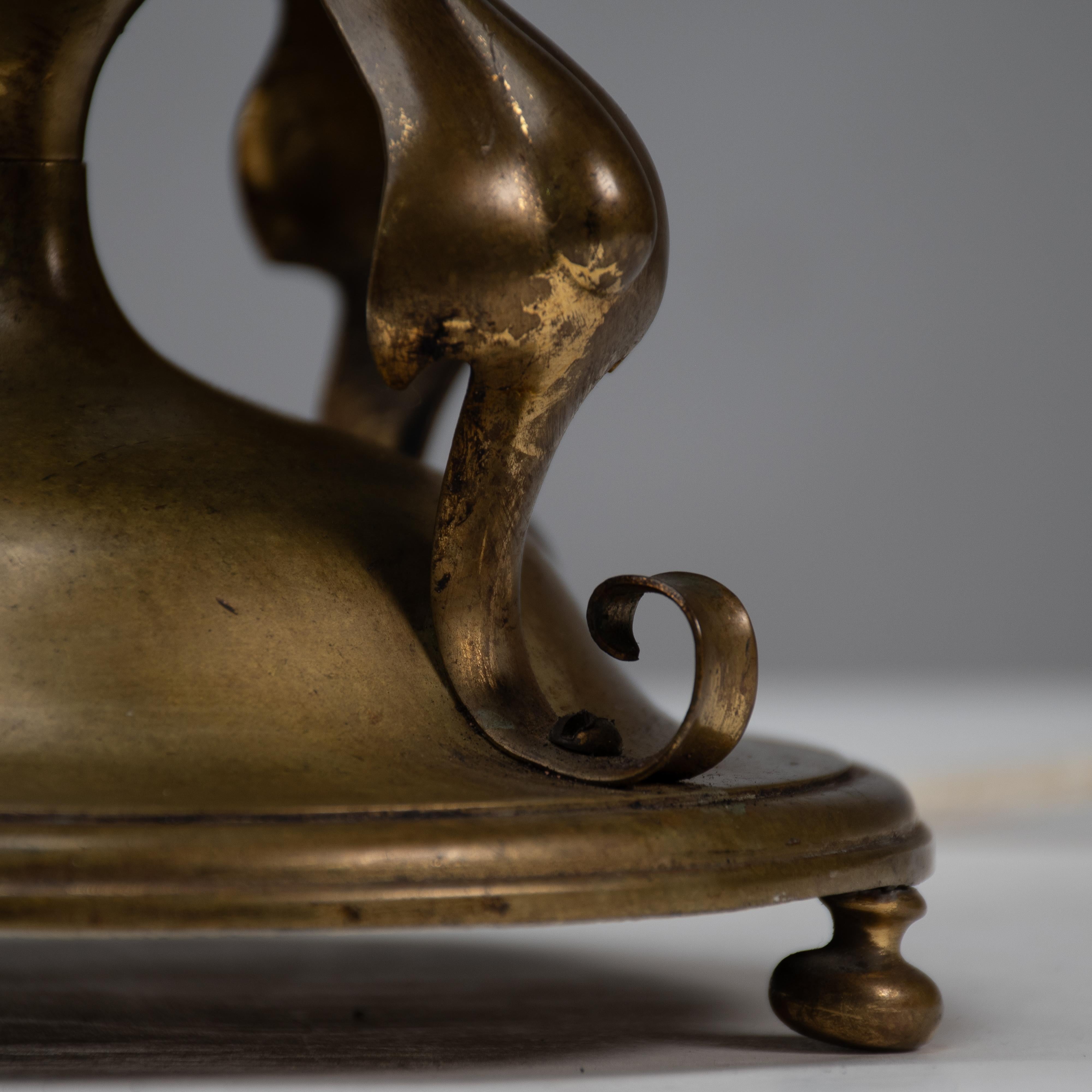 An Arts and Crafts brass table lamp in the style of C F A Voysey For Sale 12