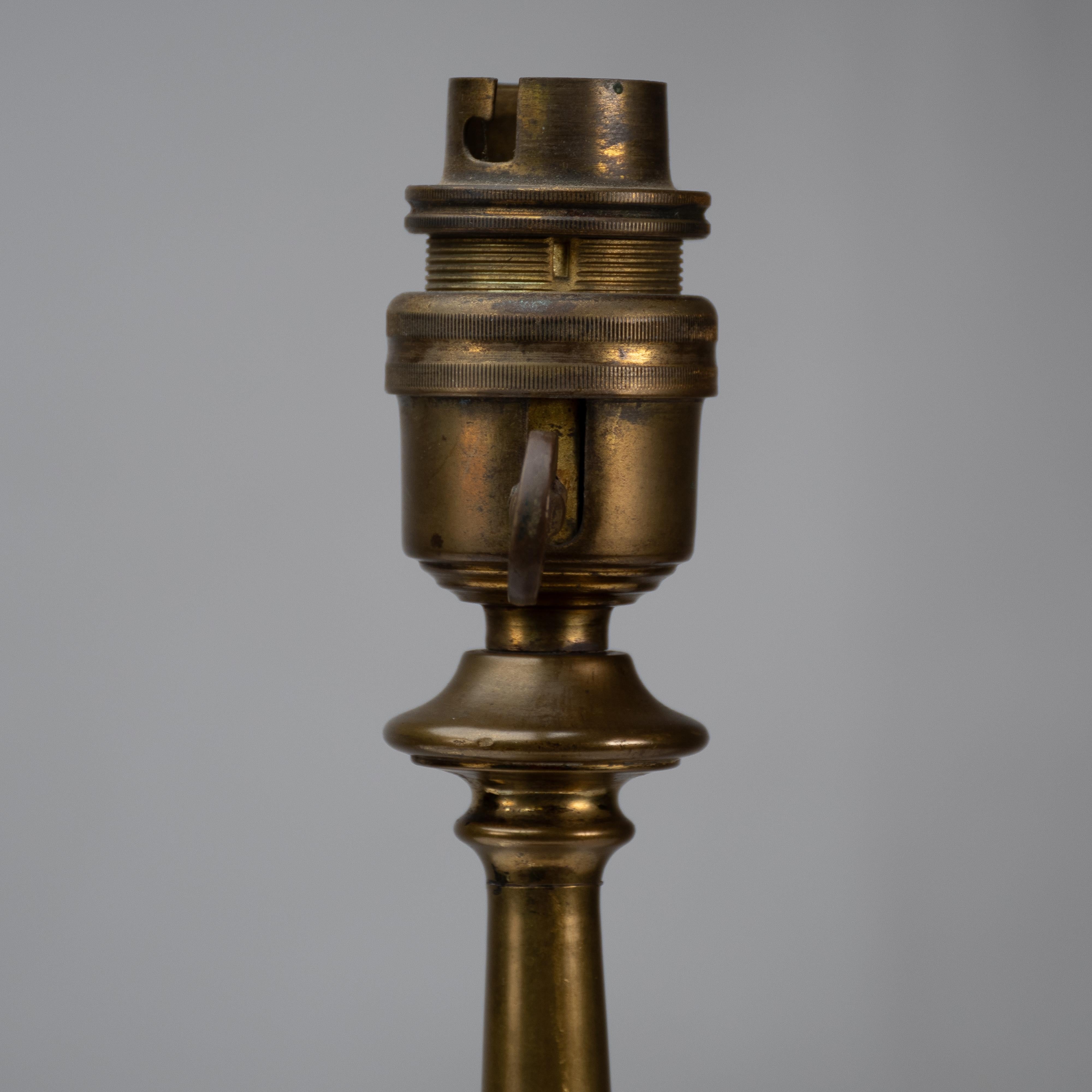 An Arts and Crafts brass table lamp in the style of C F A Voysey For Sale 3
