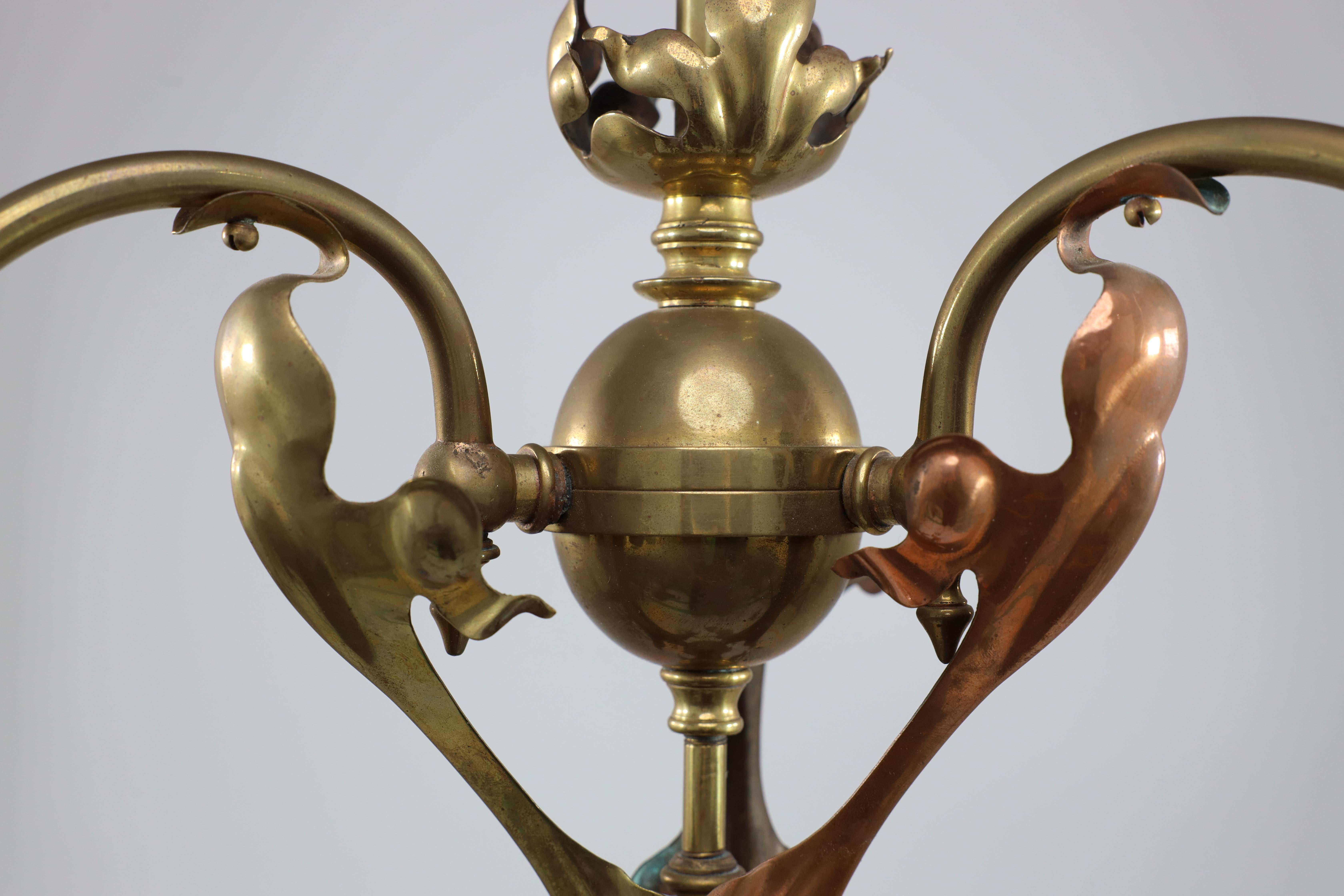 An Arts and Crafts brass three arm ceiling light with a flower bud to the top For Sale 3
