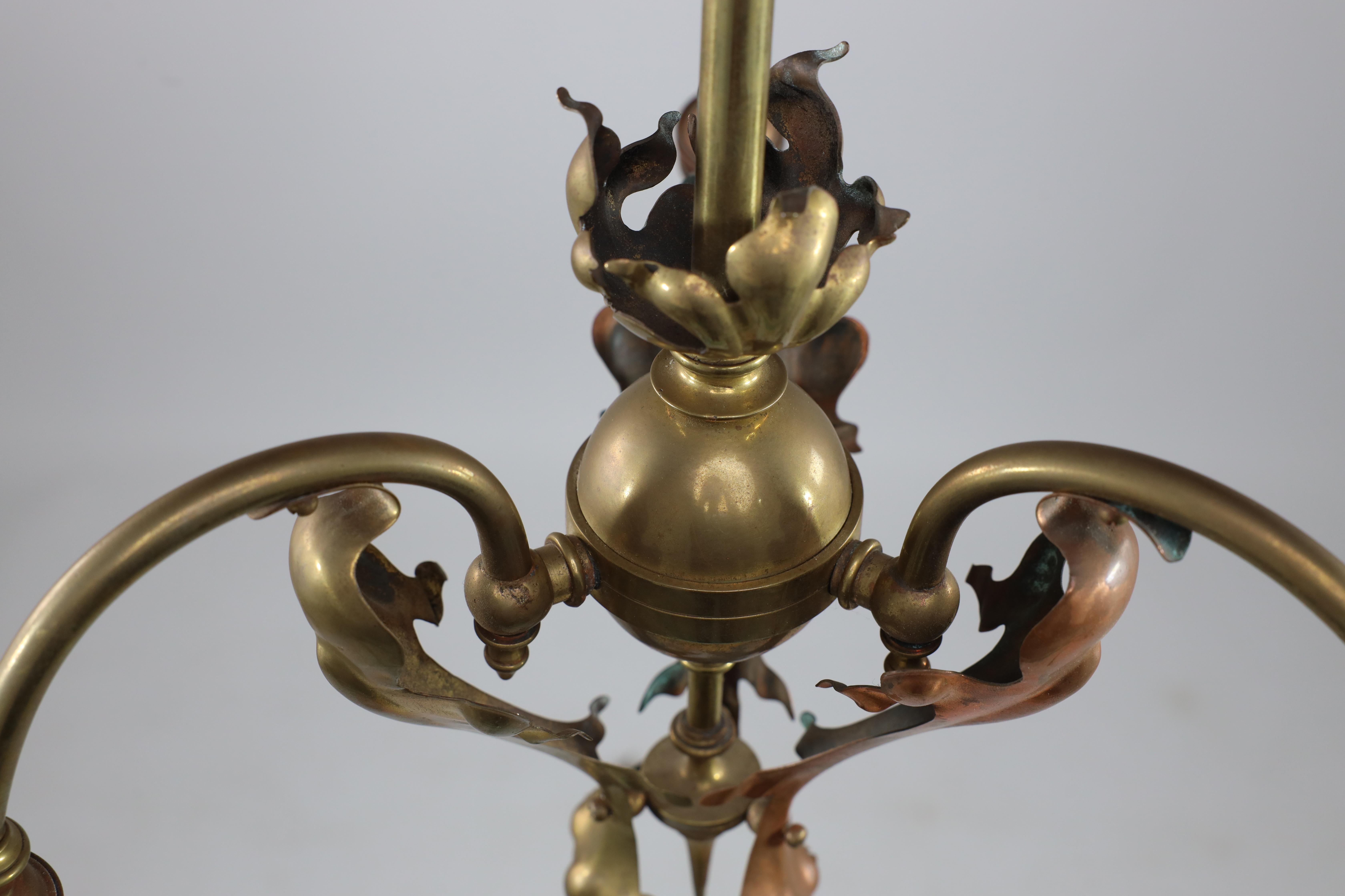 An Arts and Crafts brass three arm ceiling light with a flower bud to the top For Sale 2