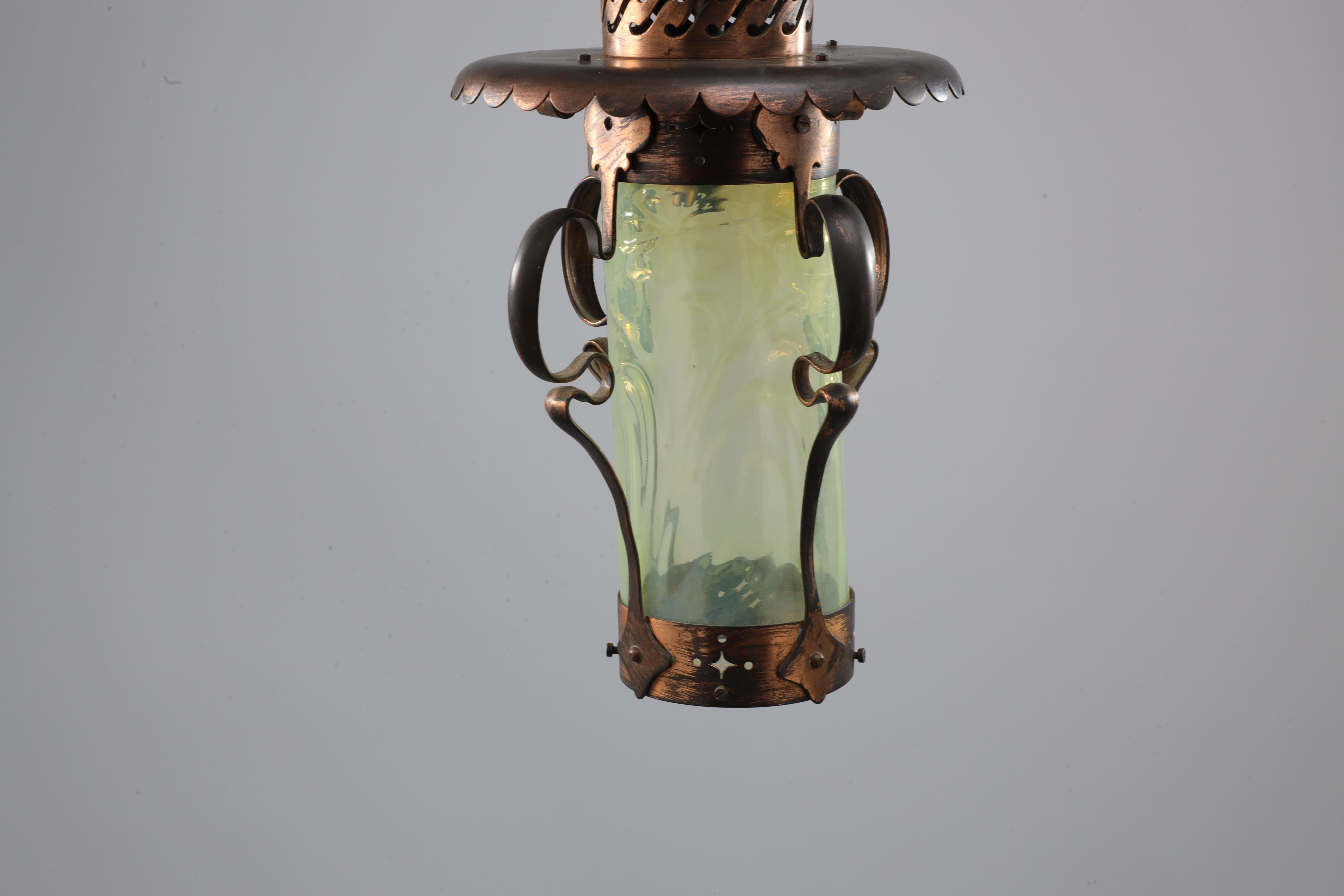 An Arts and Crafts copper & Vaseline lantern with floral flowing decoration For Sale 1