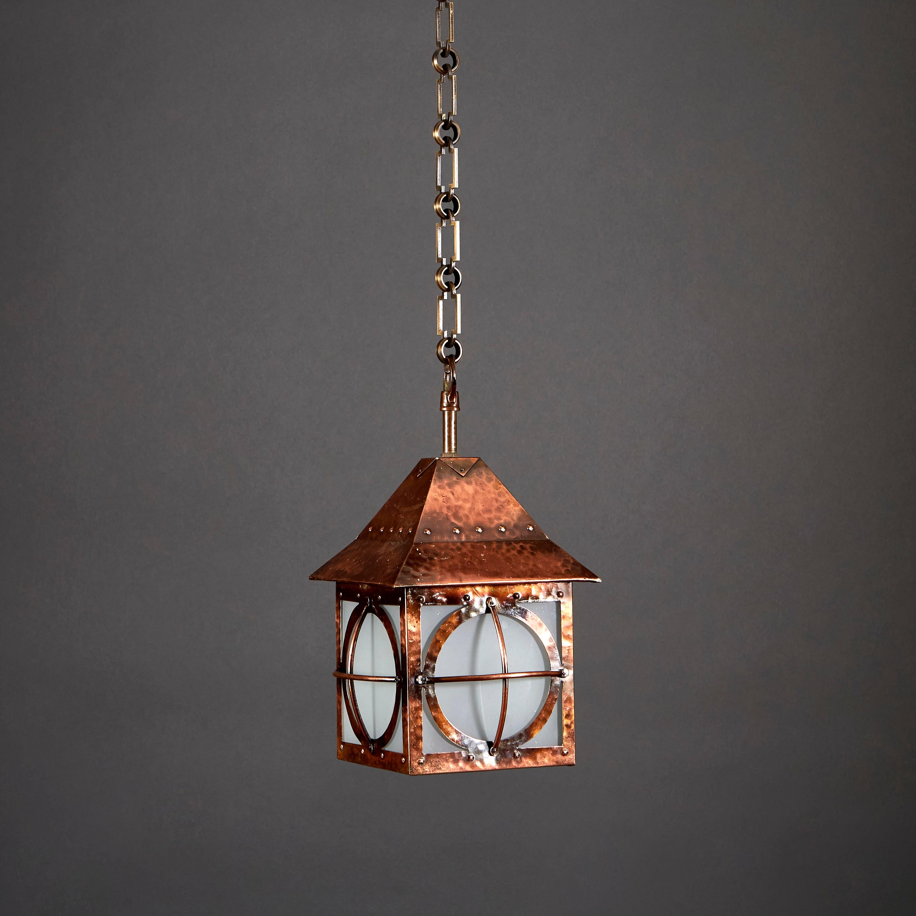 A late 19th Century Arts & Crafts copper hanging lantern with canopy and glazed sides.

Currently wired for the UK. Please enquire for rewiring services.
Chain available upon request; please contact us for details.