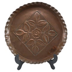 An Arts and Crafts copper plate