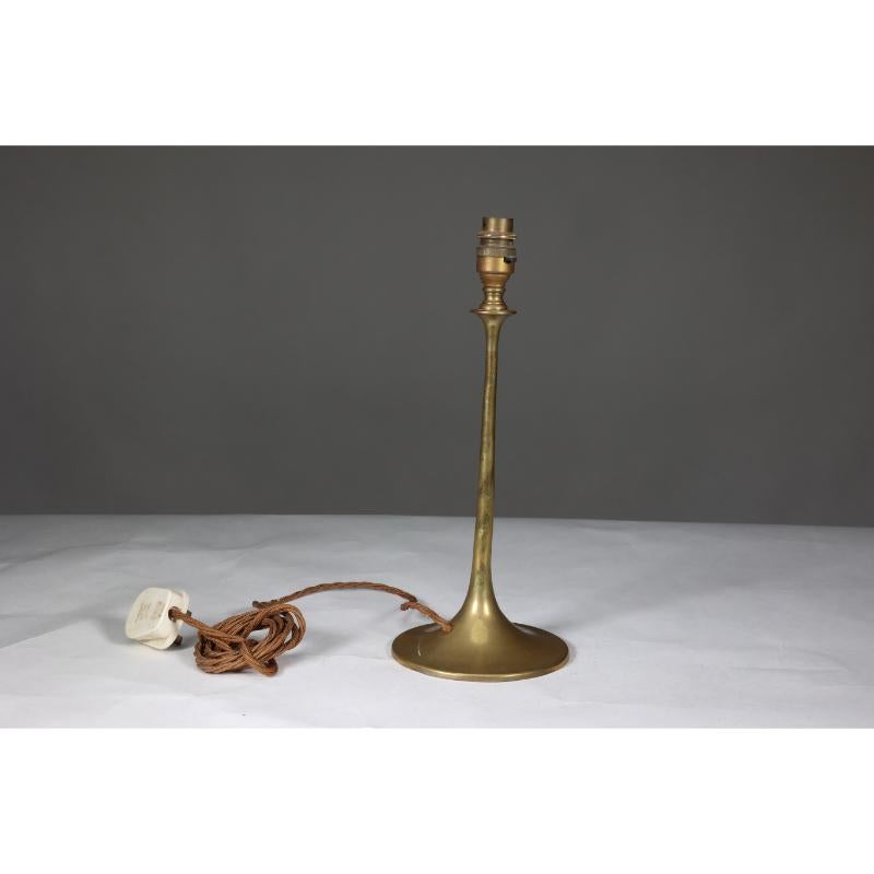 Arts and Crafts Dryad in the style of An Arts & Crafts brass table lamp with a wide flaring base For Sale