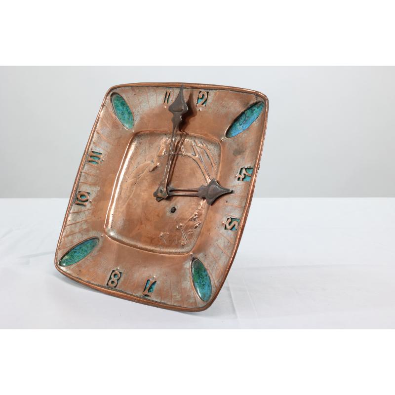 English An Arts and Crafts hand formed copper and turquoise blue enamel wall clock For Sale