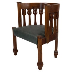 Fauteuil en chêne de style Decor Decorative Craft à décor floral stylisé en montant