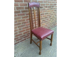 Arts and Crafts Oak Chair with Shaped Padded Head Rest and Pewter Heart Inlay