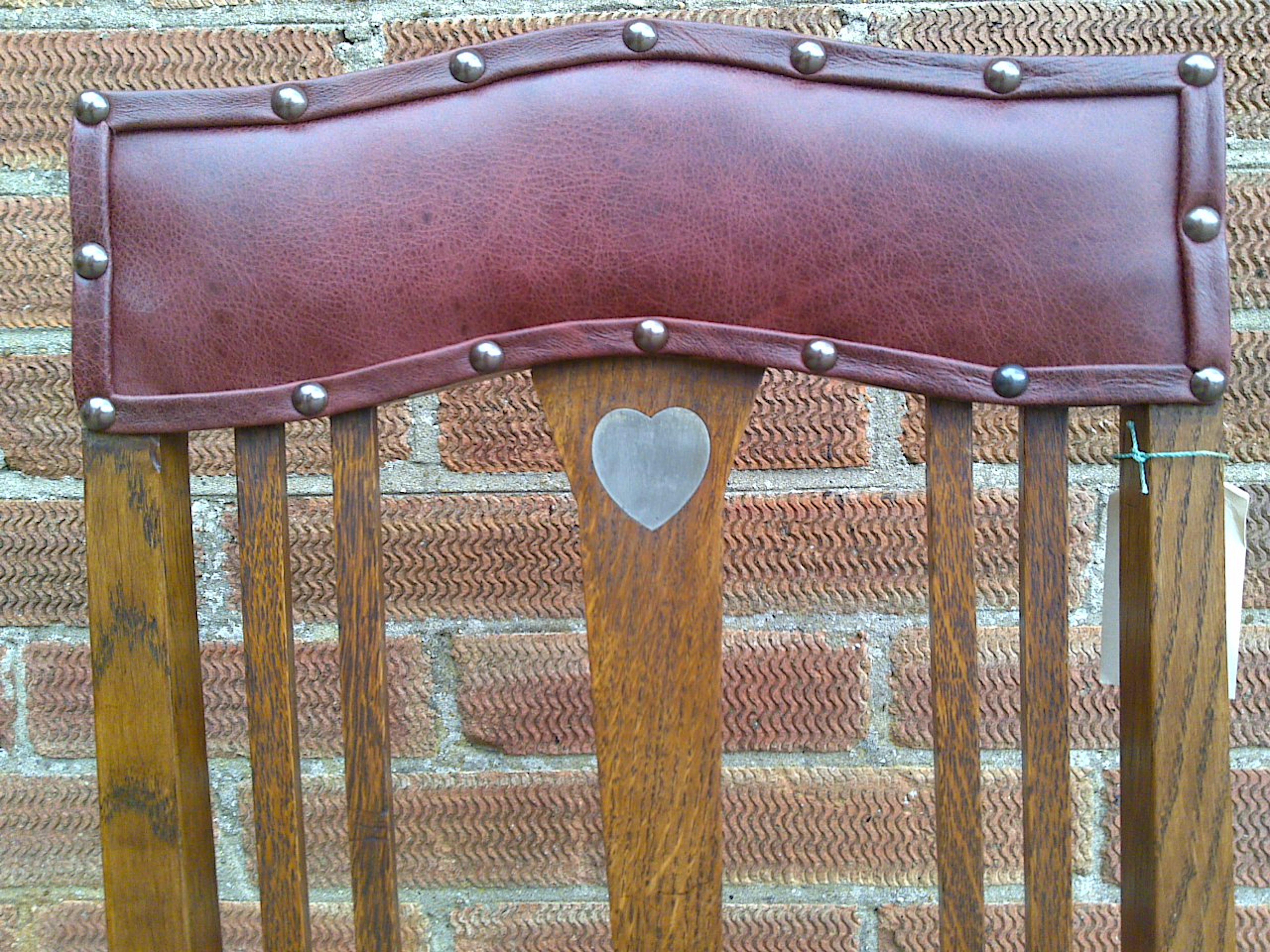 Hand-Crafted Arts and Crafts Oak Chair with Shaped Padded Head Rest and Pewter Heart Inlay For Sale