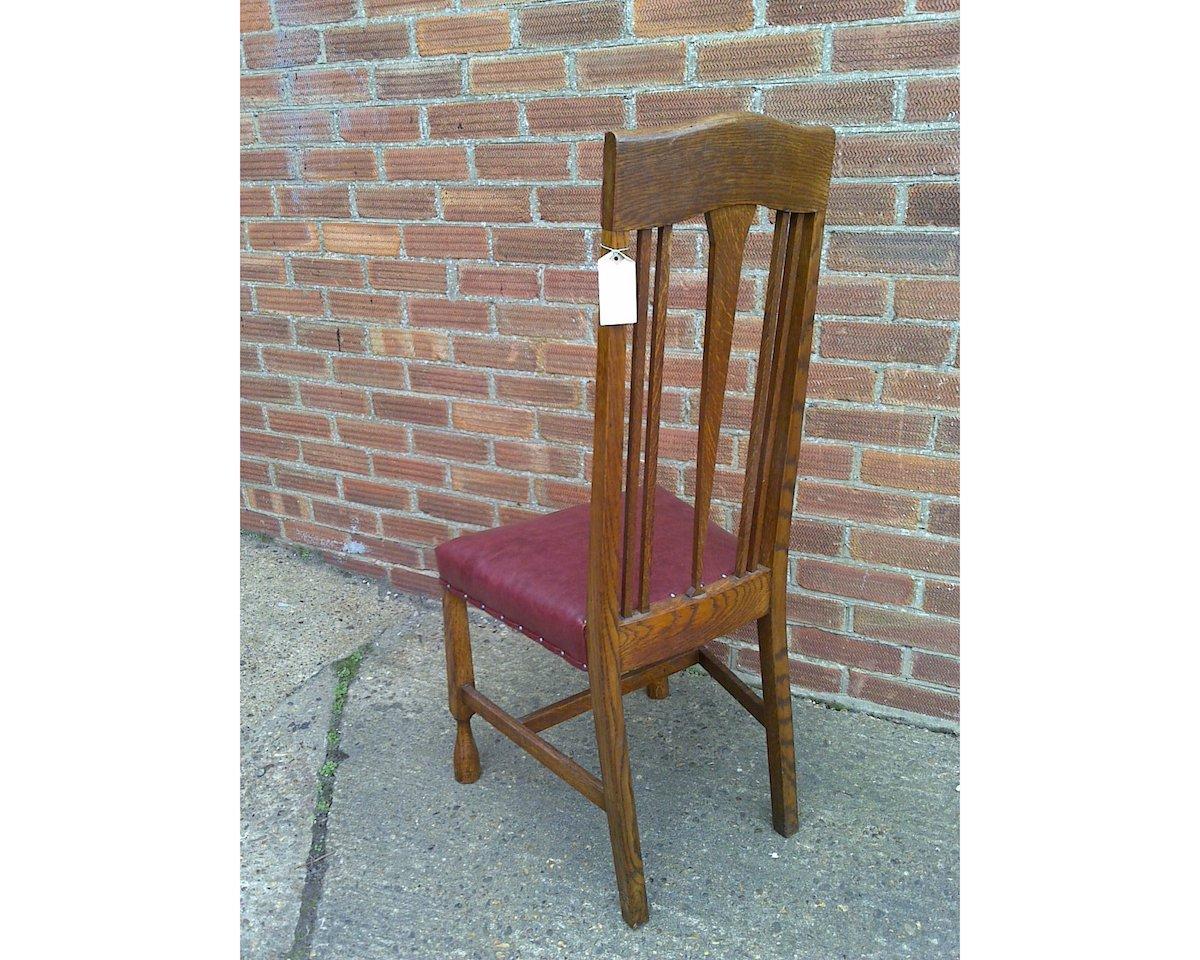 Arts and Crafts Oak Chair with Shaped Padded Head Rest and Pewter Heart Inlay In Good Condition For Sale In London, GB