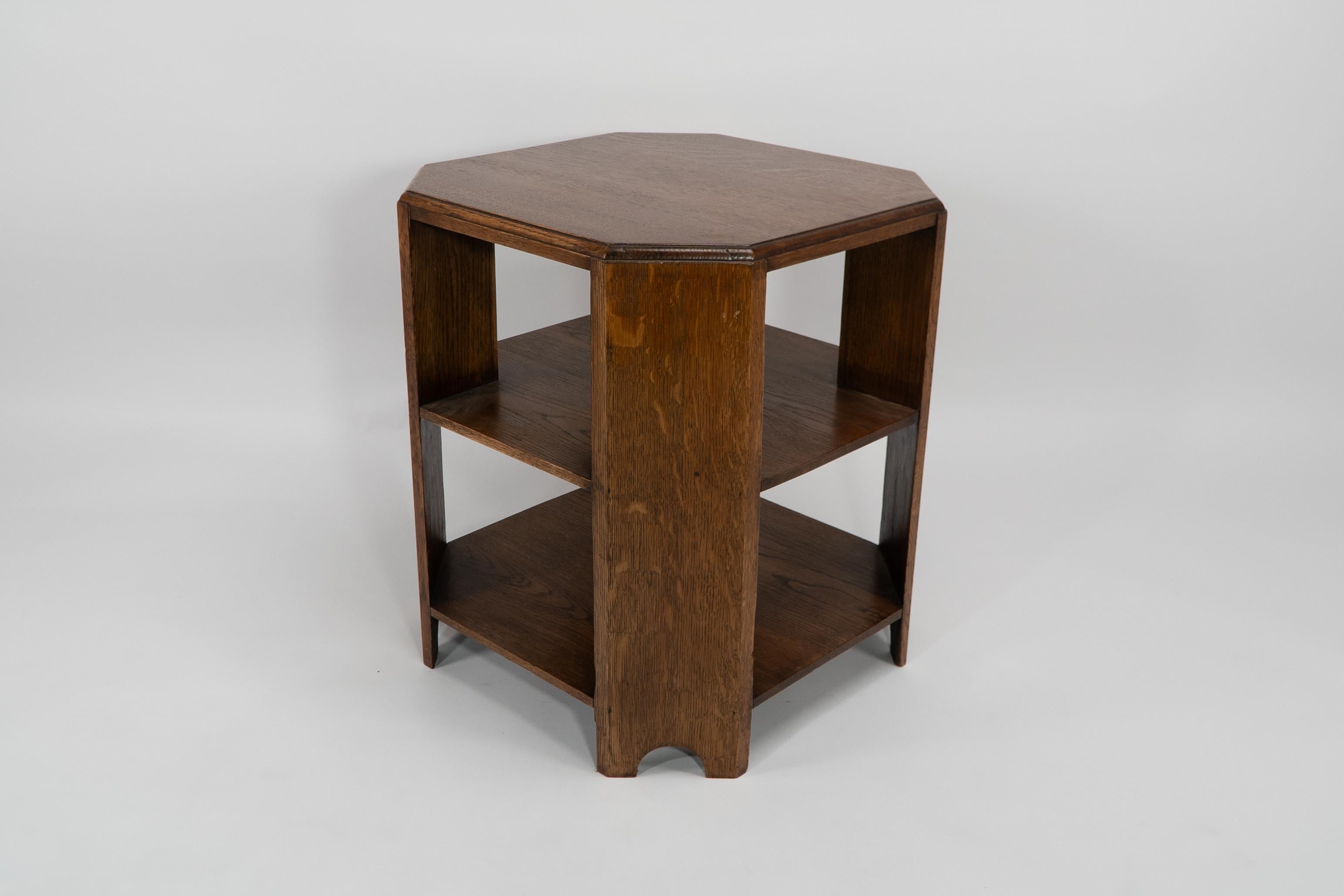 Arts and Crafts Heals. Arts & Crafts oak octagonal coffee or side table with lower book shelves.