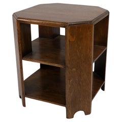 Heals. Arts & Crafts oak octagonal coffee or side table with lower book shelves.