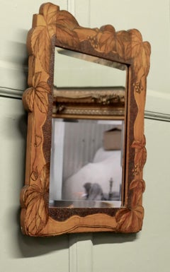 An Arts and Crafts Poker Work Wall Mirror