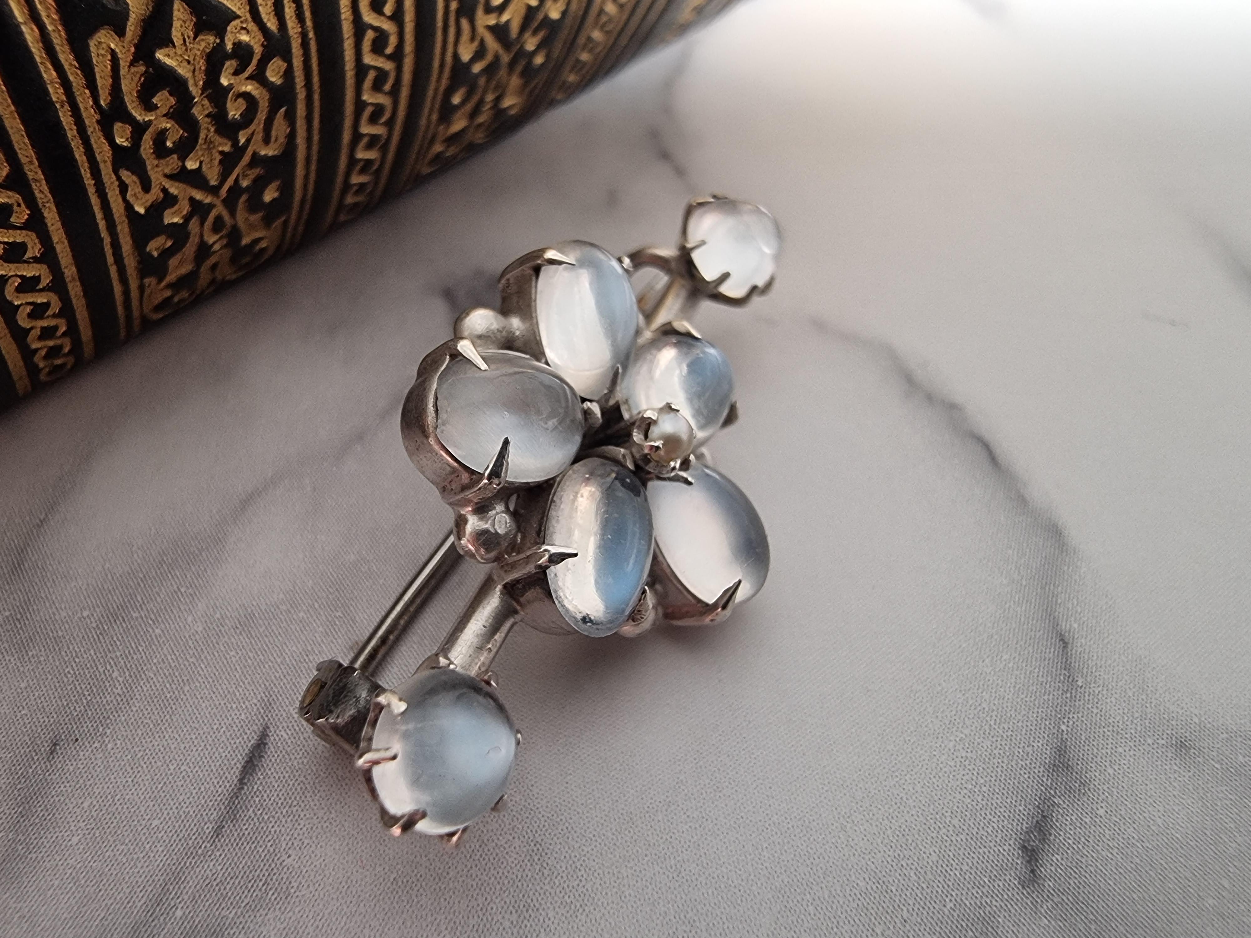 English An Arts and Crafts silver and moonstone brooch circa 1900 For Sale