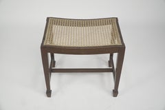 An Arts and Crafts sturdy little Walnut stool
